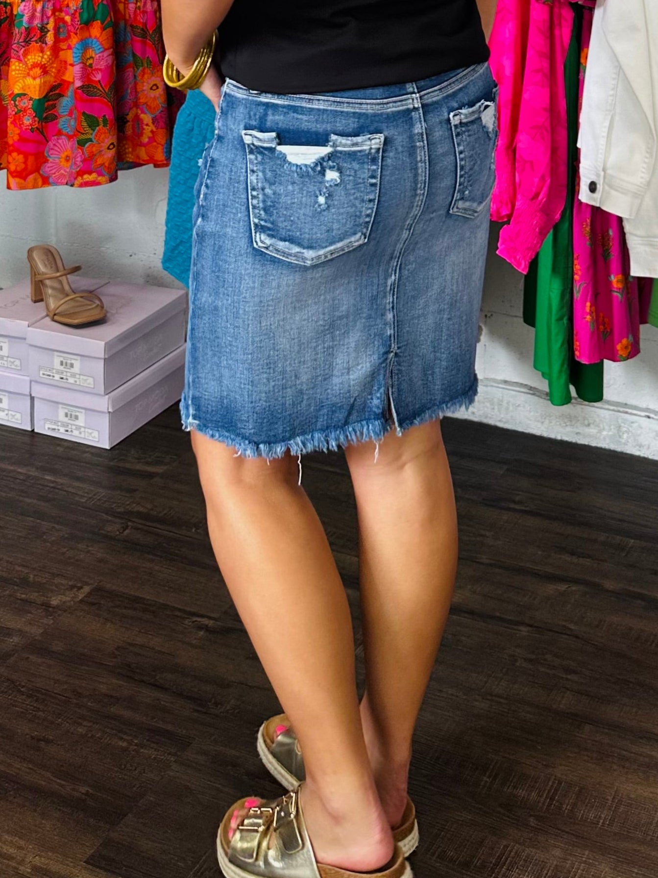 The High Rise Medium Short Frayed Hem Denim Skirt