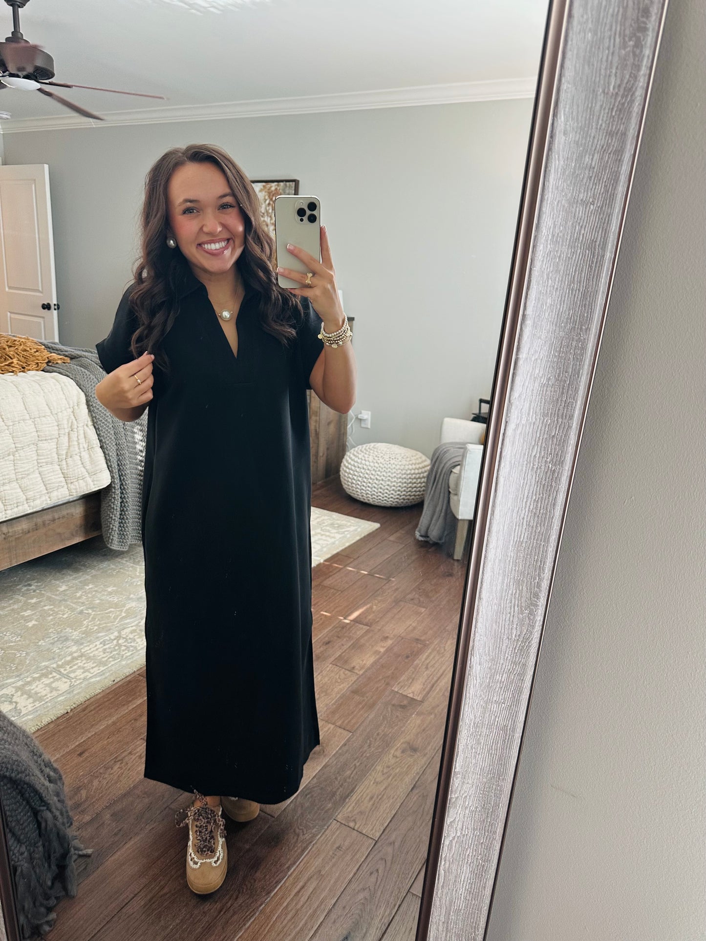 The Nola Black V-neck Midi Dress