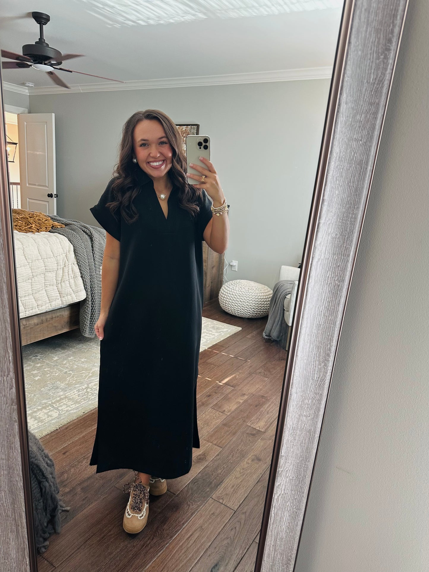 The Nola Black V-neck Midi Dress