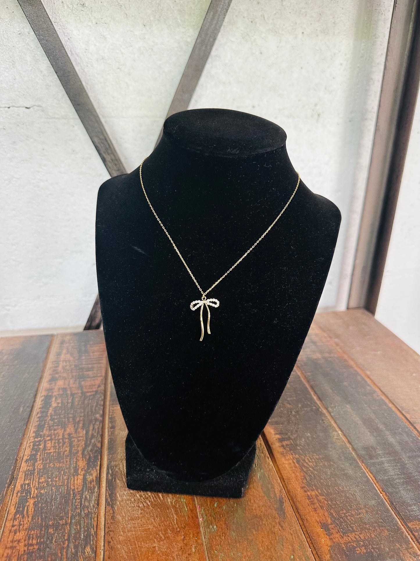 Gold Cubic Zirconia Bow Necklace