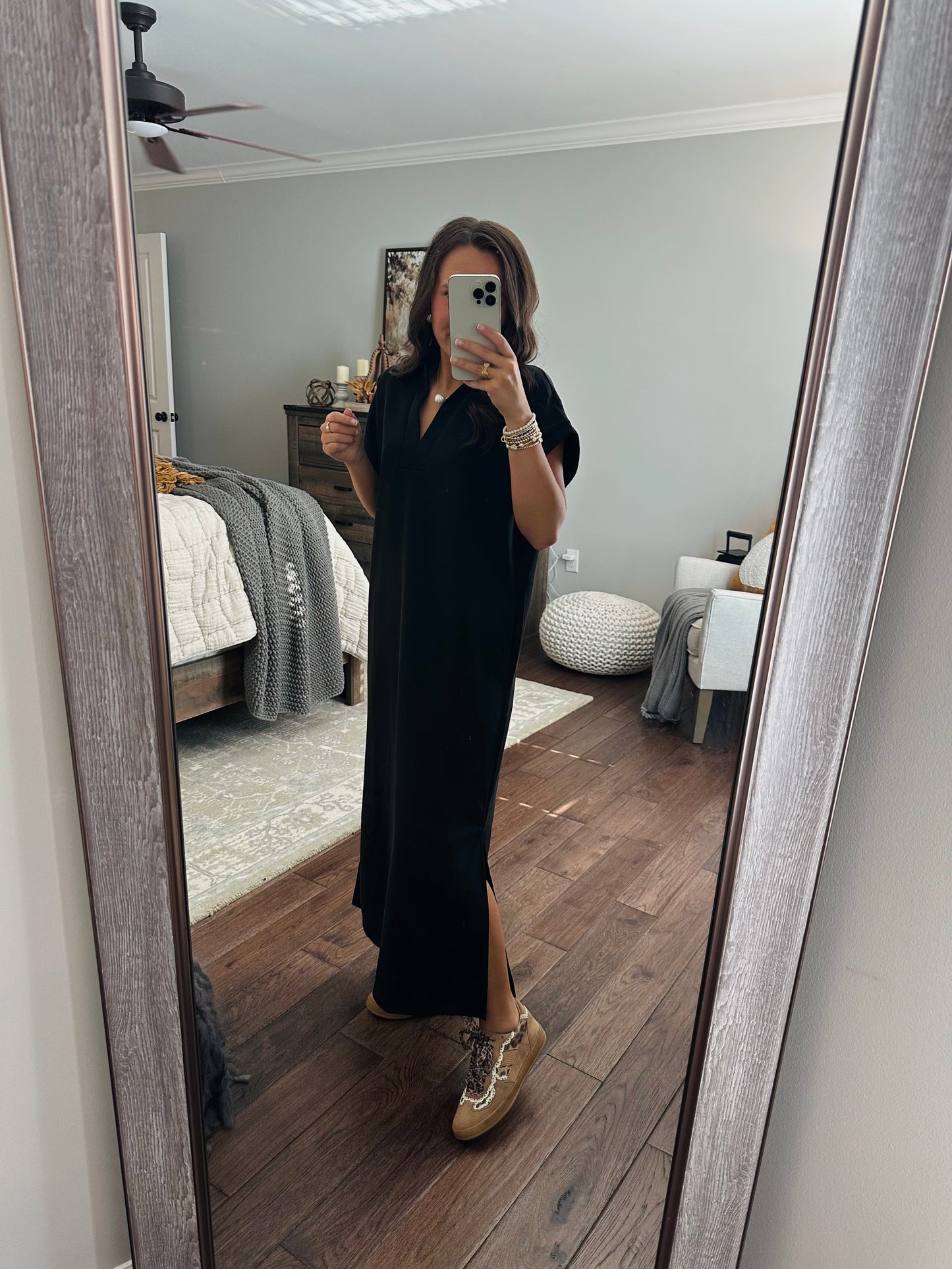 The Nola Black V-neck Midi Dress