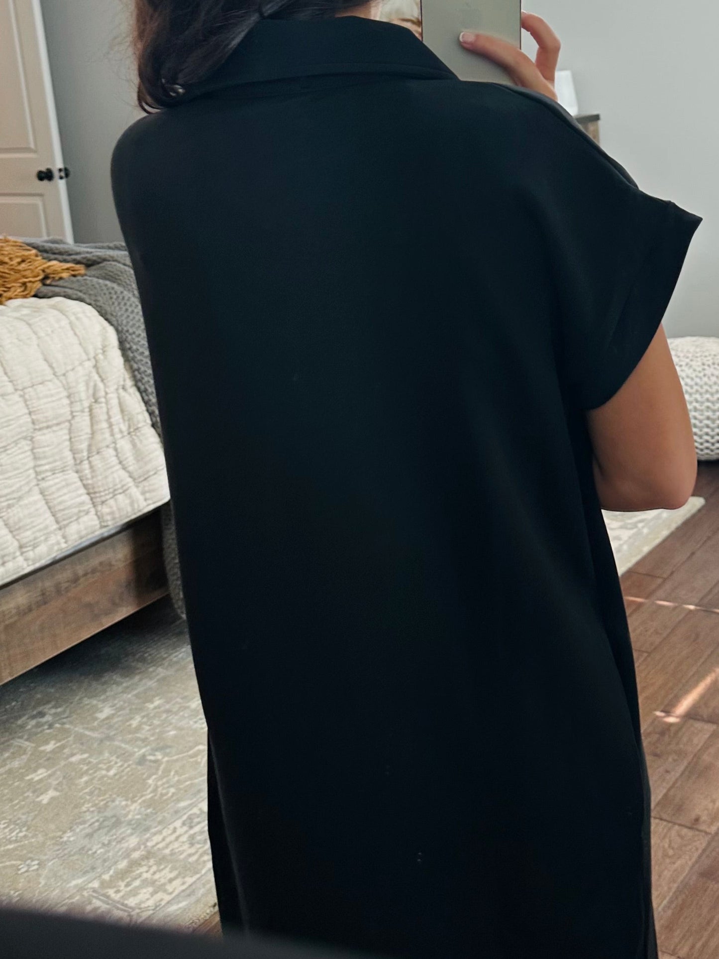 The Nola Black V-neck Midi Dress