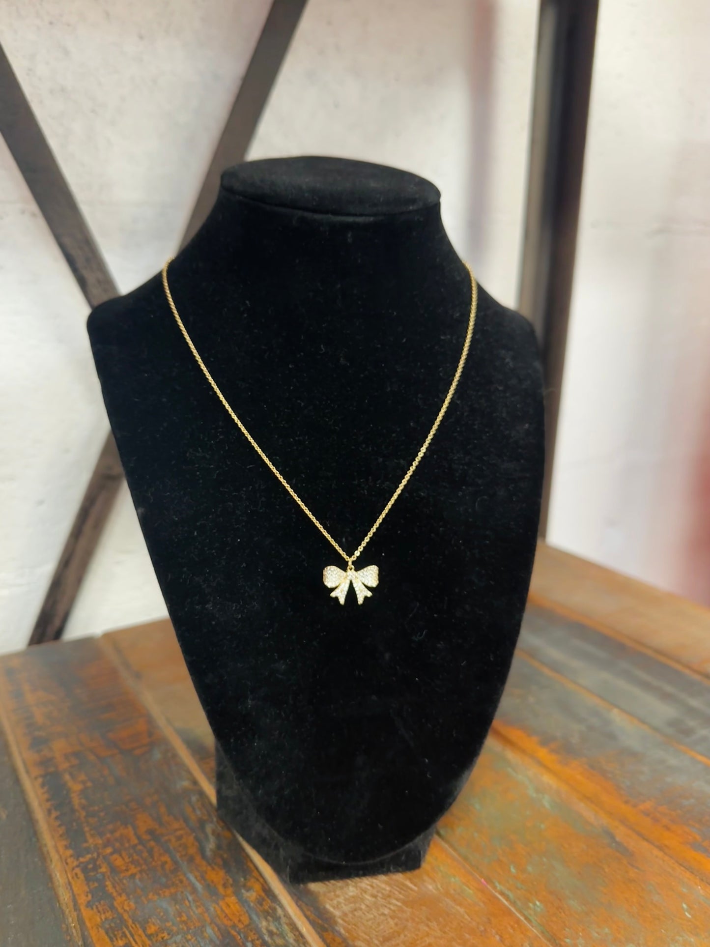 Gold Cubic Zirconia Bow Pendant Necklace