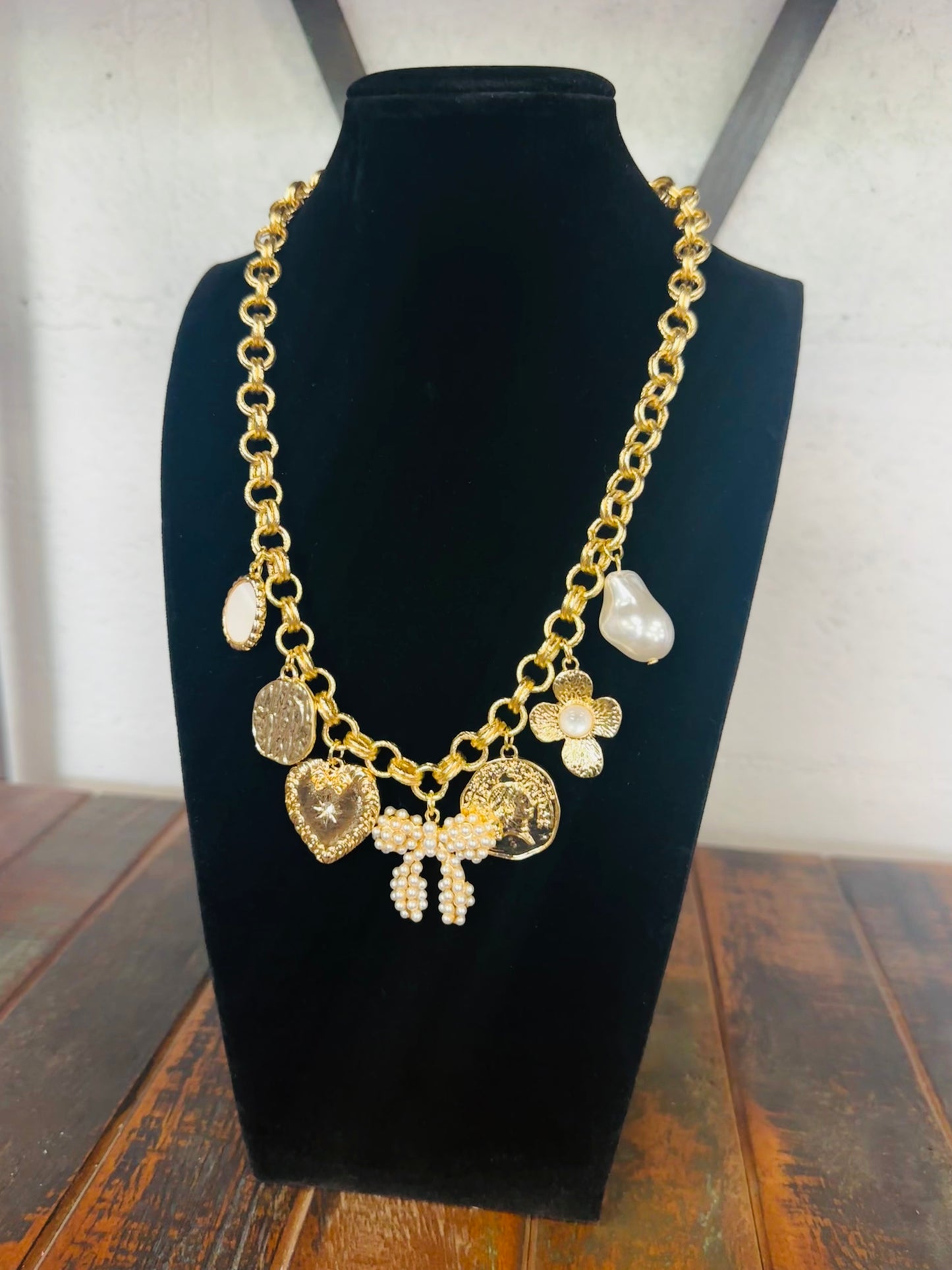 Gold Bow Multi Charm Necklace