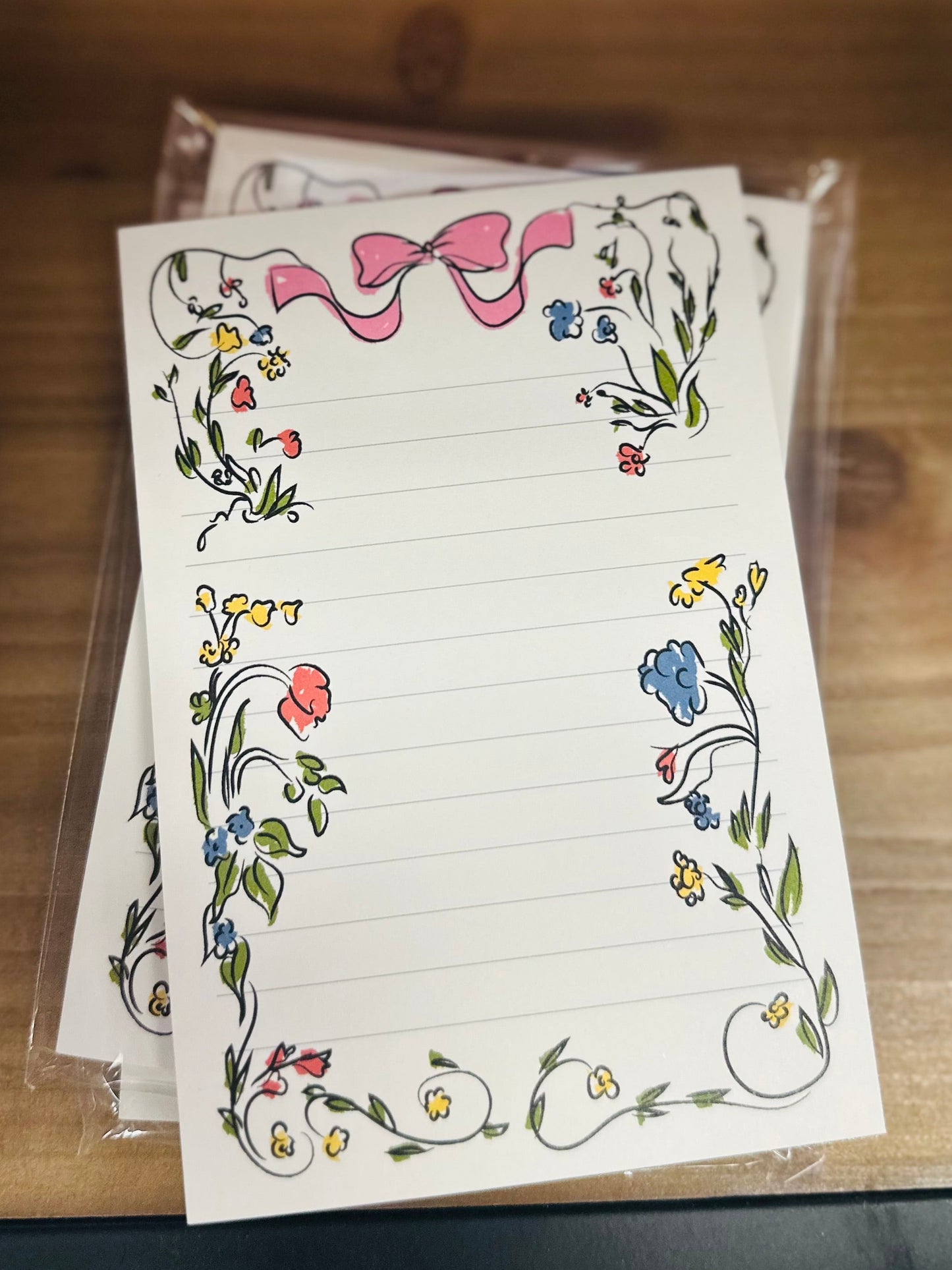 Hand Drawn Floral Bow Border Notepad