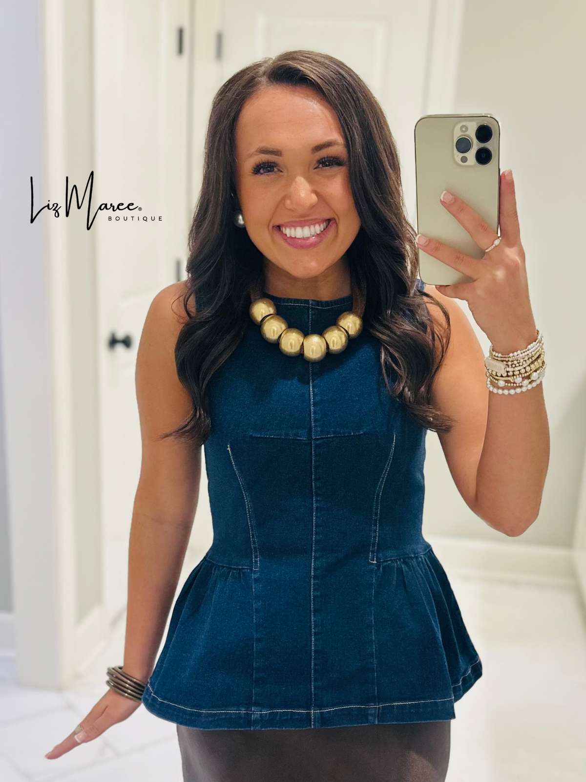 The Nell Denim Peplum Top