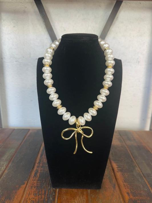 The Maggie Pearl + Gold Wide Bead Bow Pendant Necklace