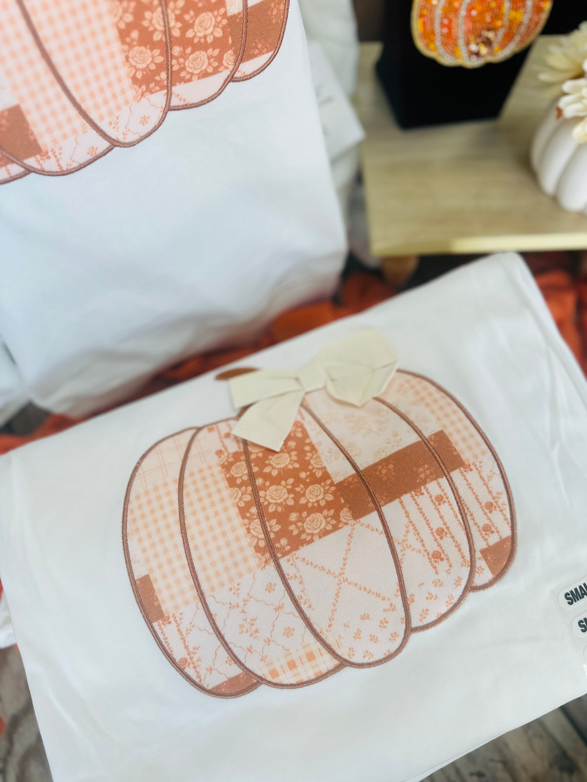The Patchwork Pumpkin Bow Sweatshirt