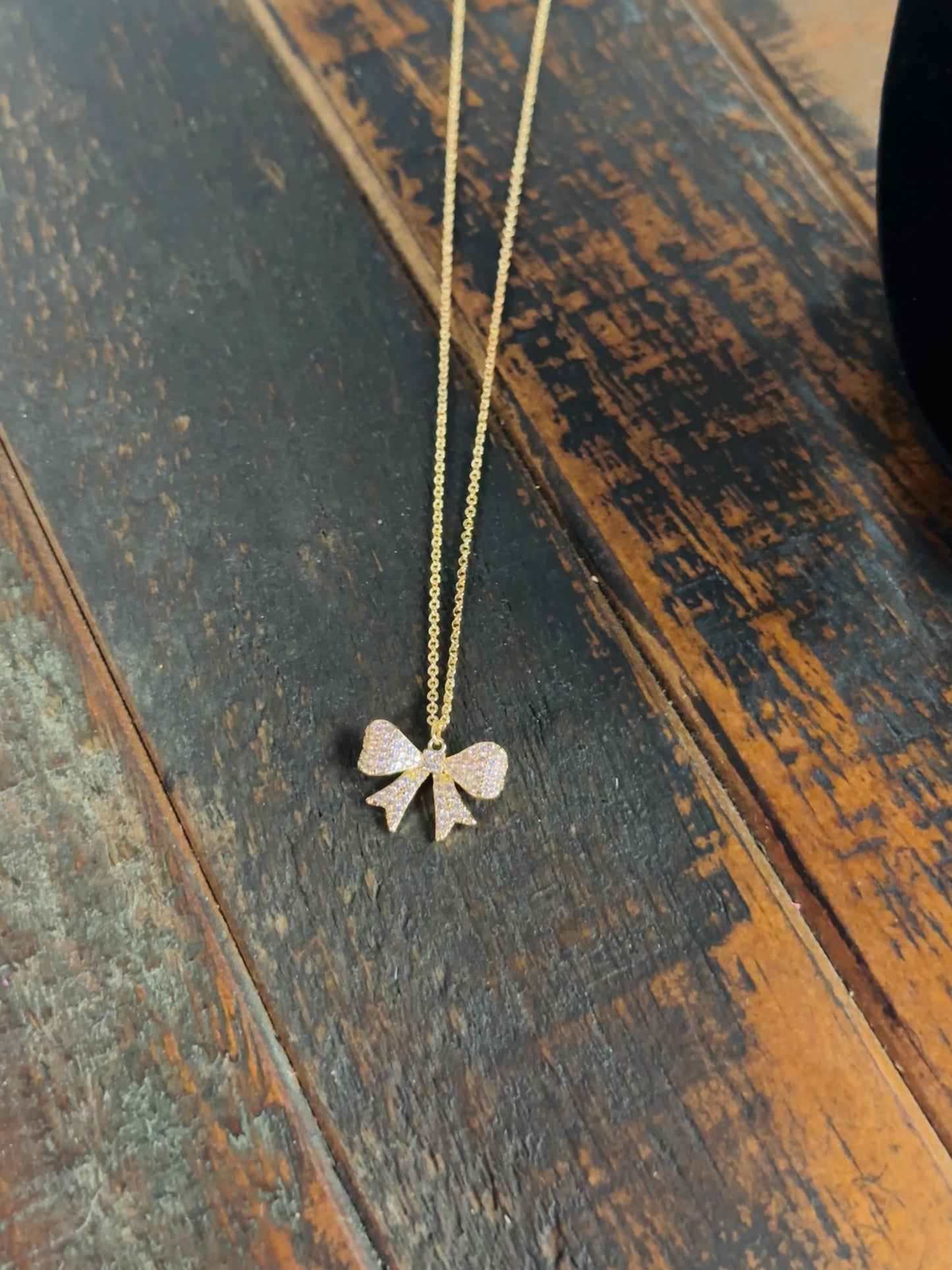 Gold Cubic Zirconia Bow Pendant Necklace