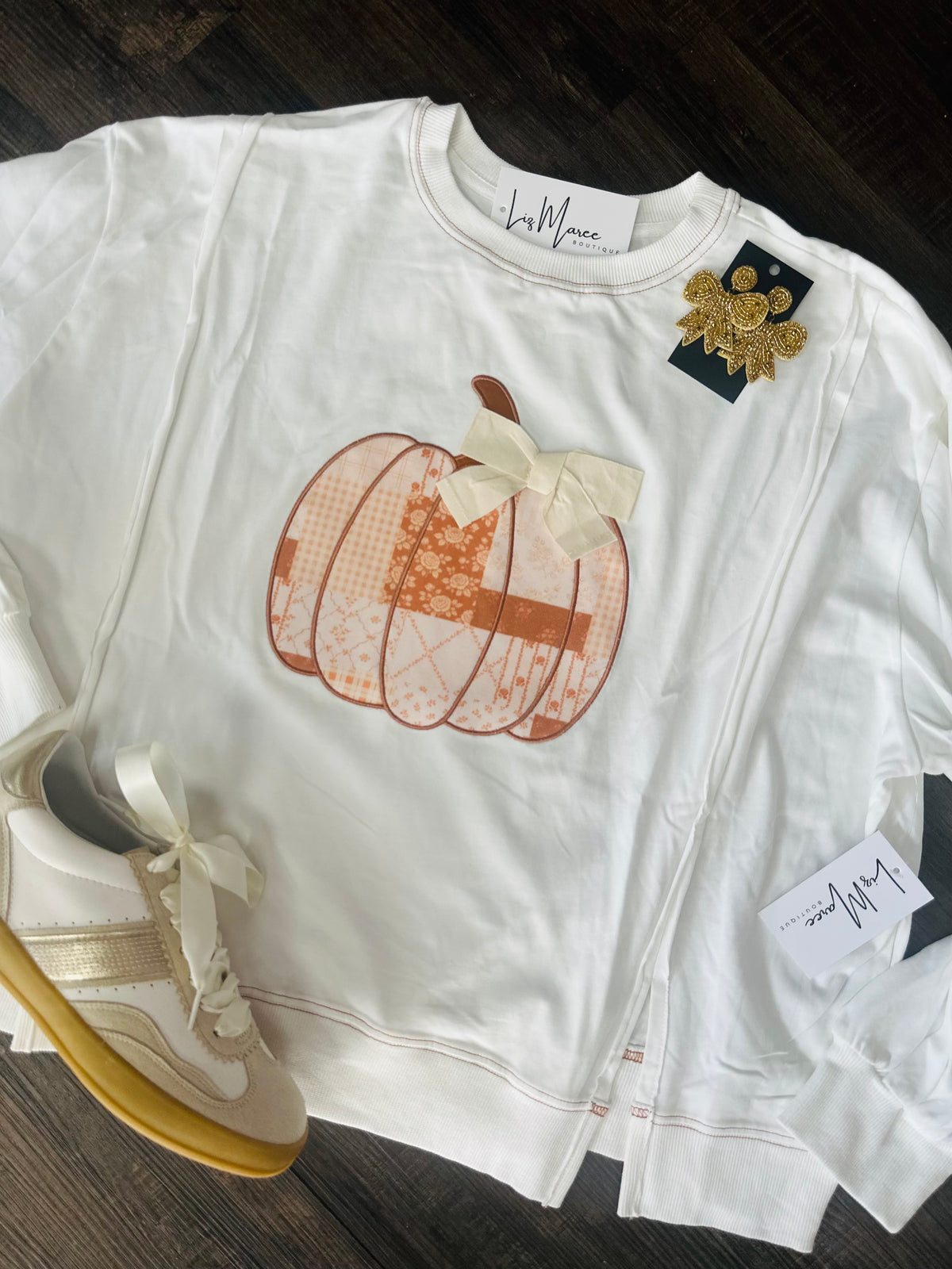 The Patchwork Pumpkin Bow Sweatshirt