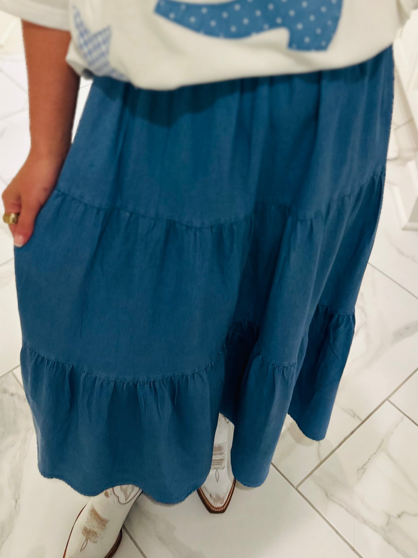 The Light Wash Denim Chambray Tiered Maxi Skirt