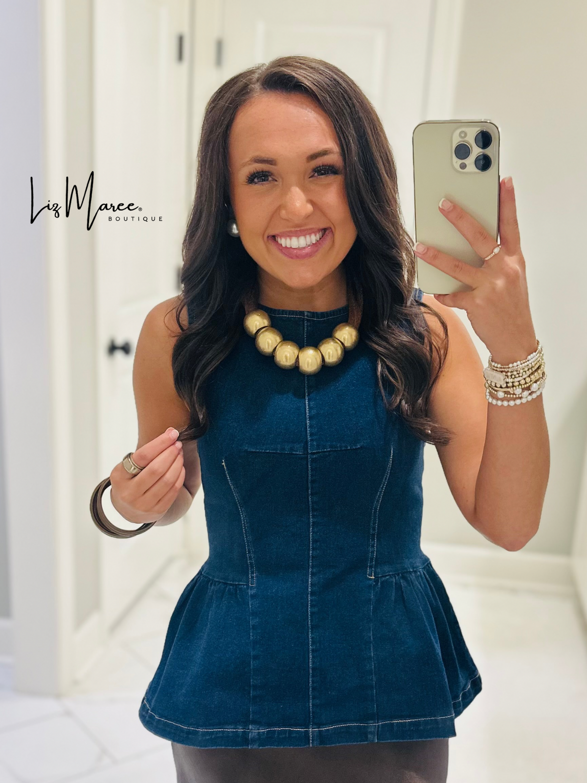 The Nell Denim Peplum Top