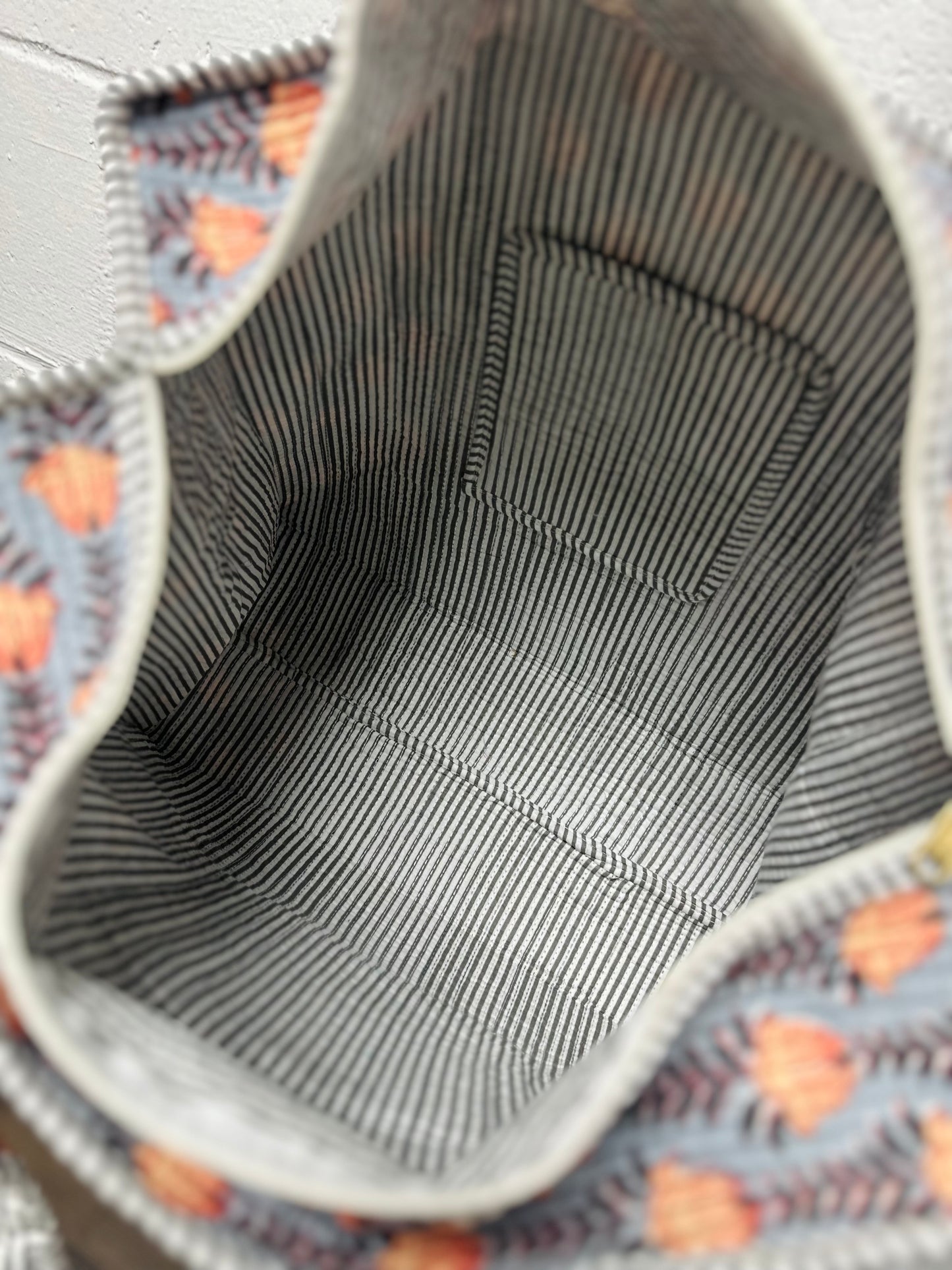 The Gray & Orange Floral Quilted Tote Bag
