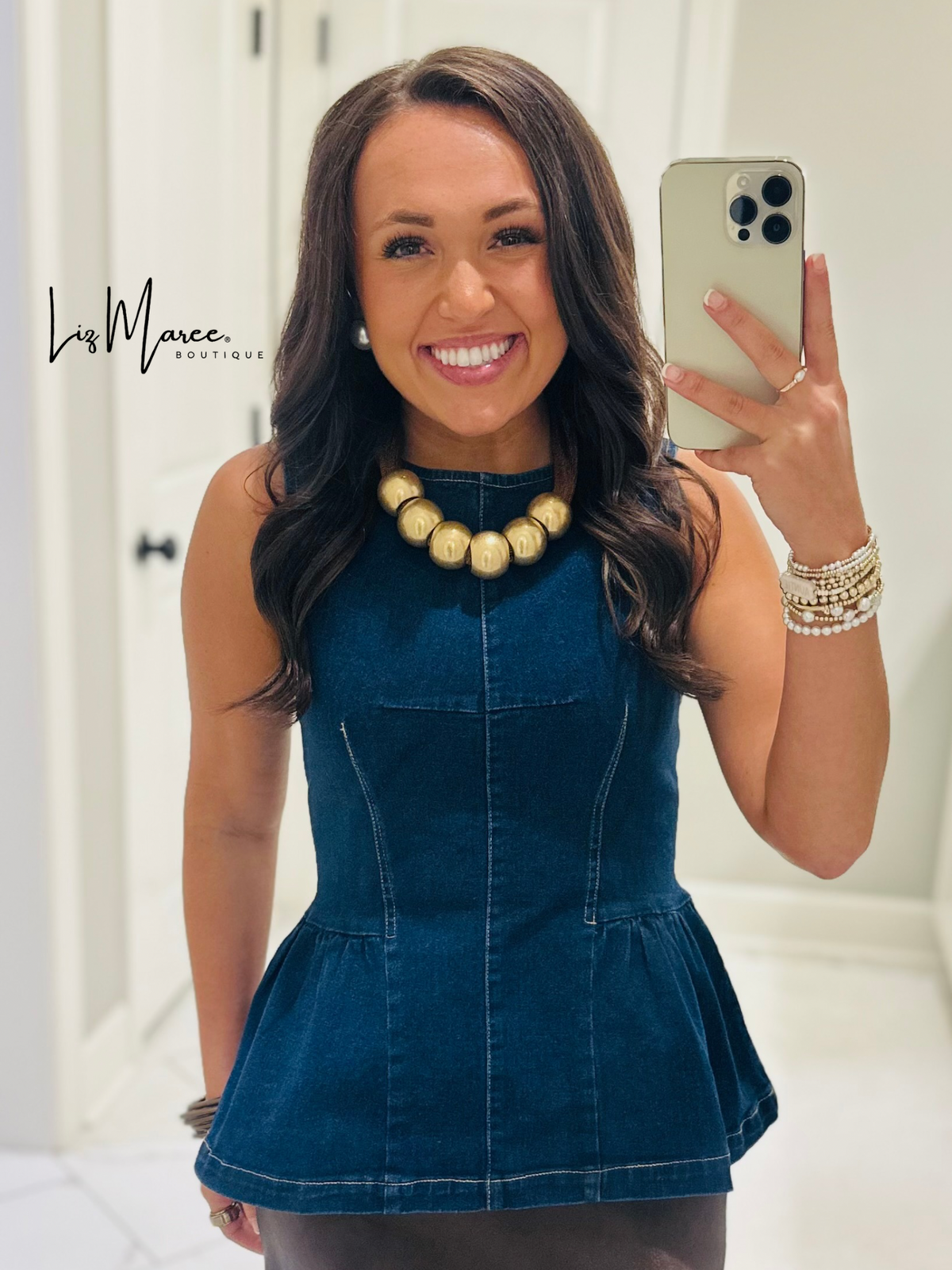 The Nell Denim Peplum Top