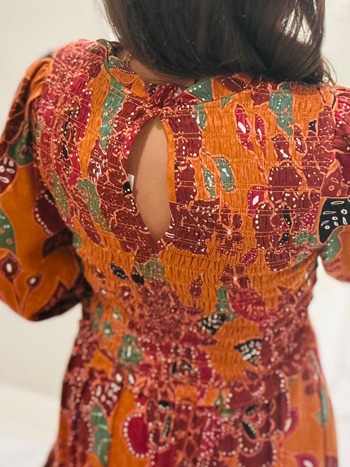 The Marven Rust Brown Floral Smocked Midi Dress