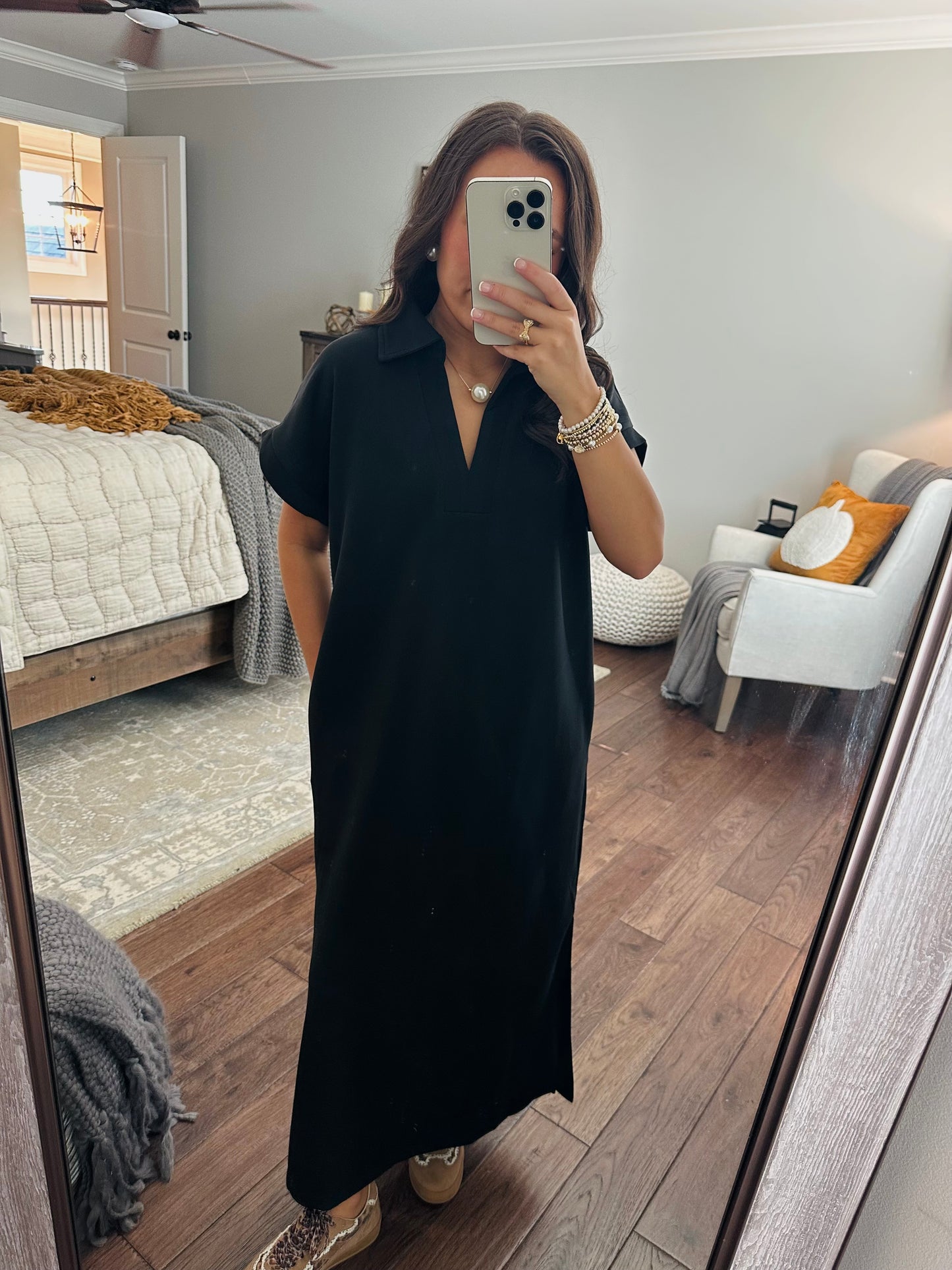 The Nola Black V-neck Midi Dress