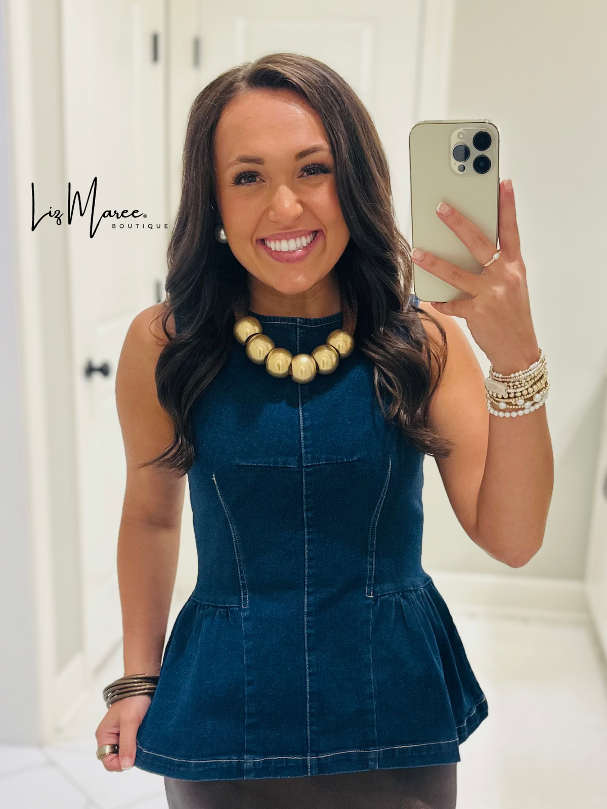 The Nell Denim Peplum Top