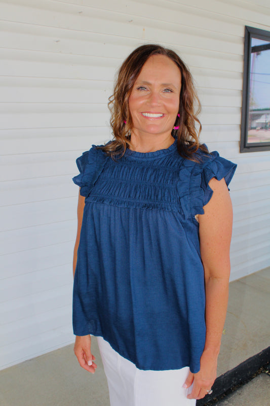 The Navy Smocked Ruffle Top