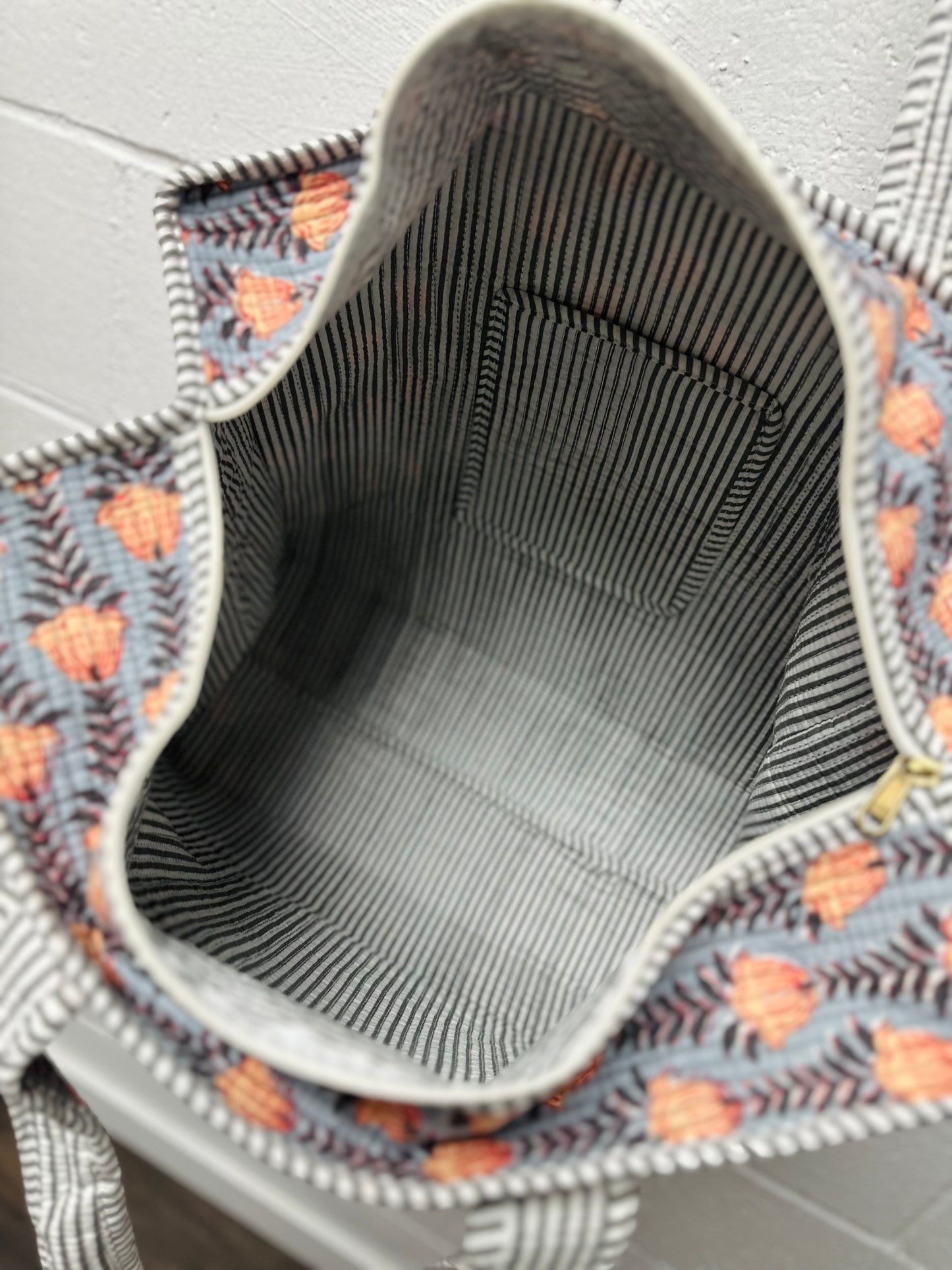 The Gray & Orange Floral Quilted Tote Bag