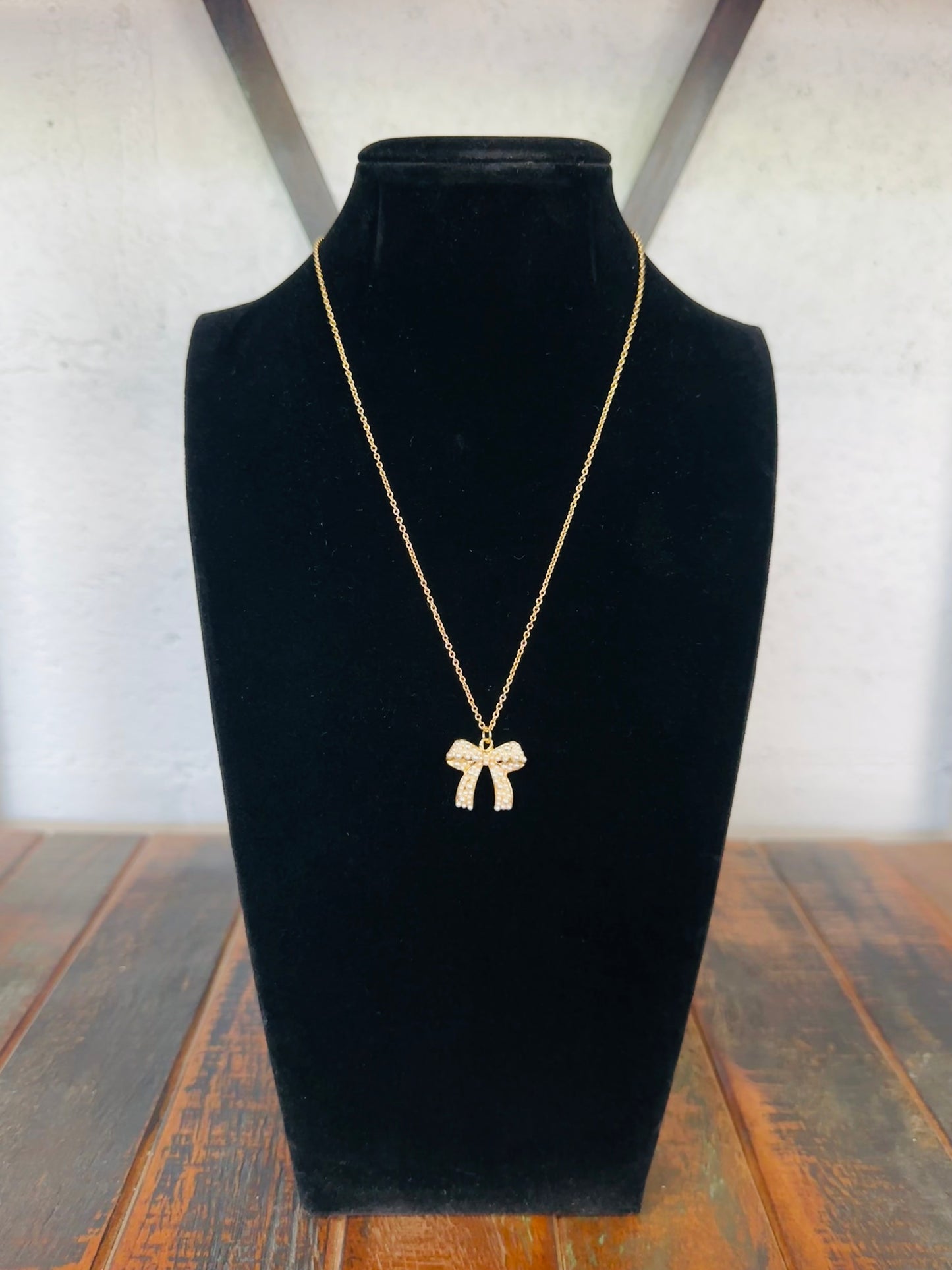Gold Pearl Bow Pendant Necklace