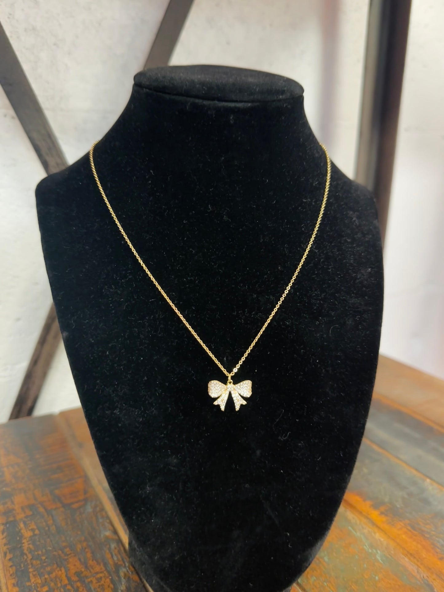 Gold Cubic Zirconia Bow Pendant Necklace
