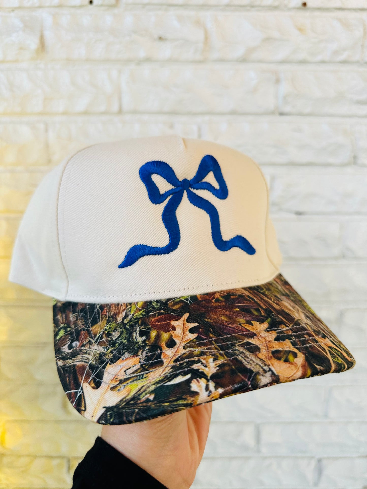 The Royal Blue Bow + Camo Trucker Hat