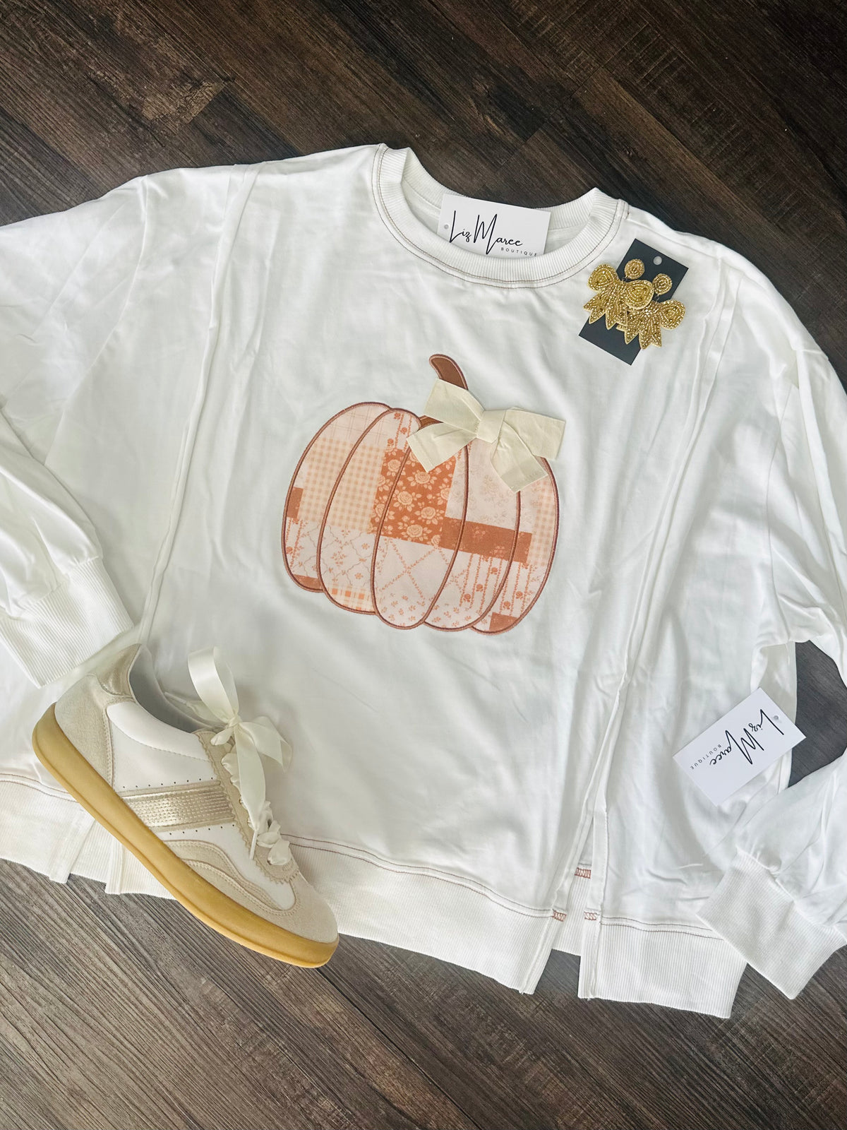 The Patchwork Pumpkin Bow Sweatshirt