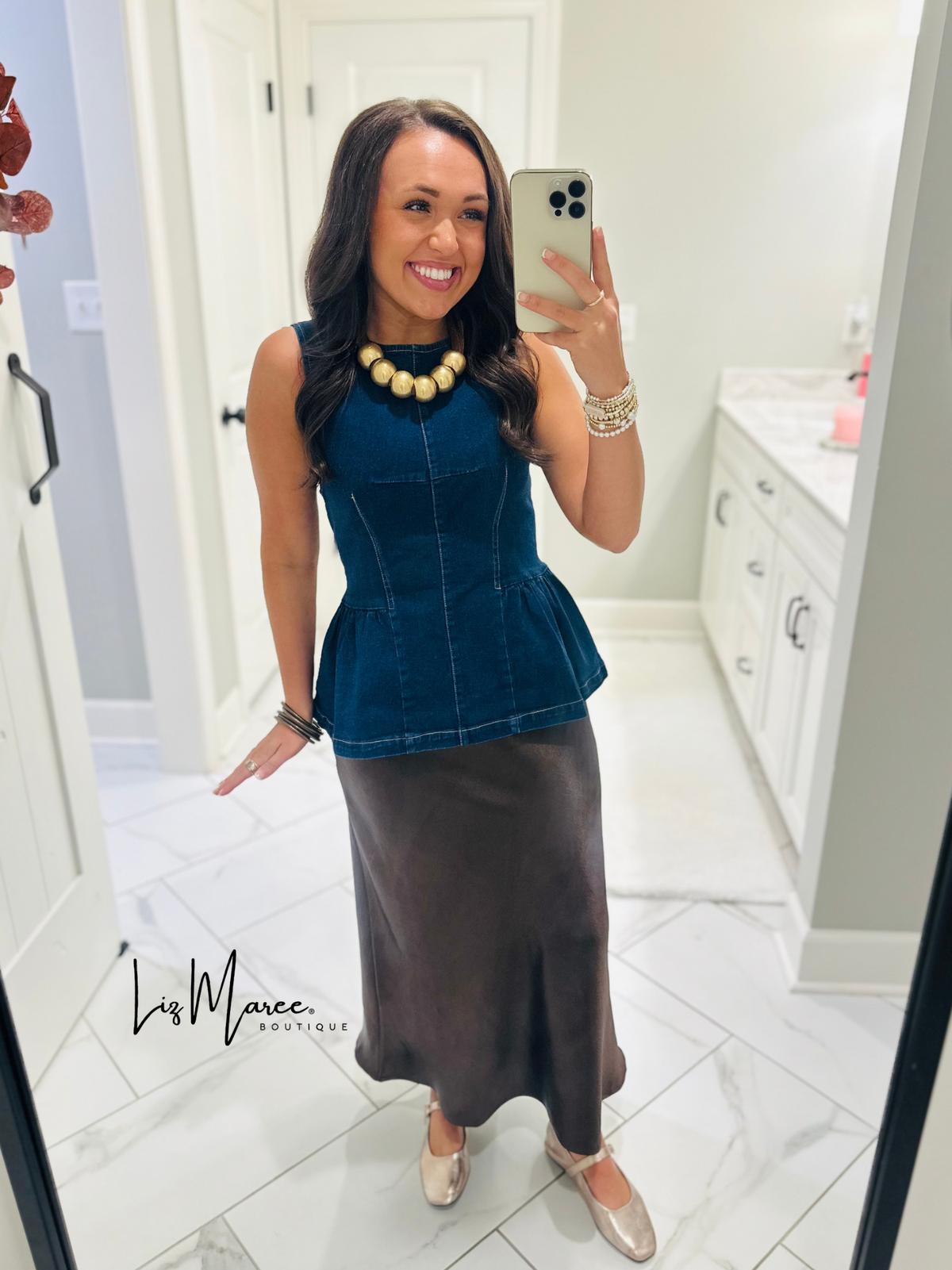 The Nell Denim Peplum Top