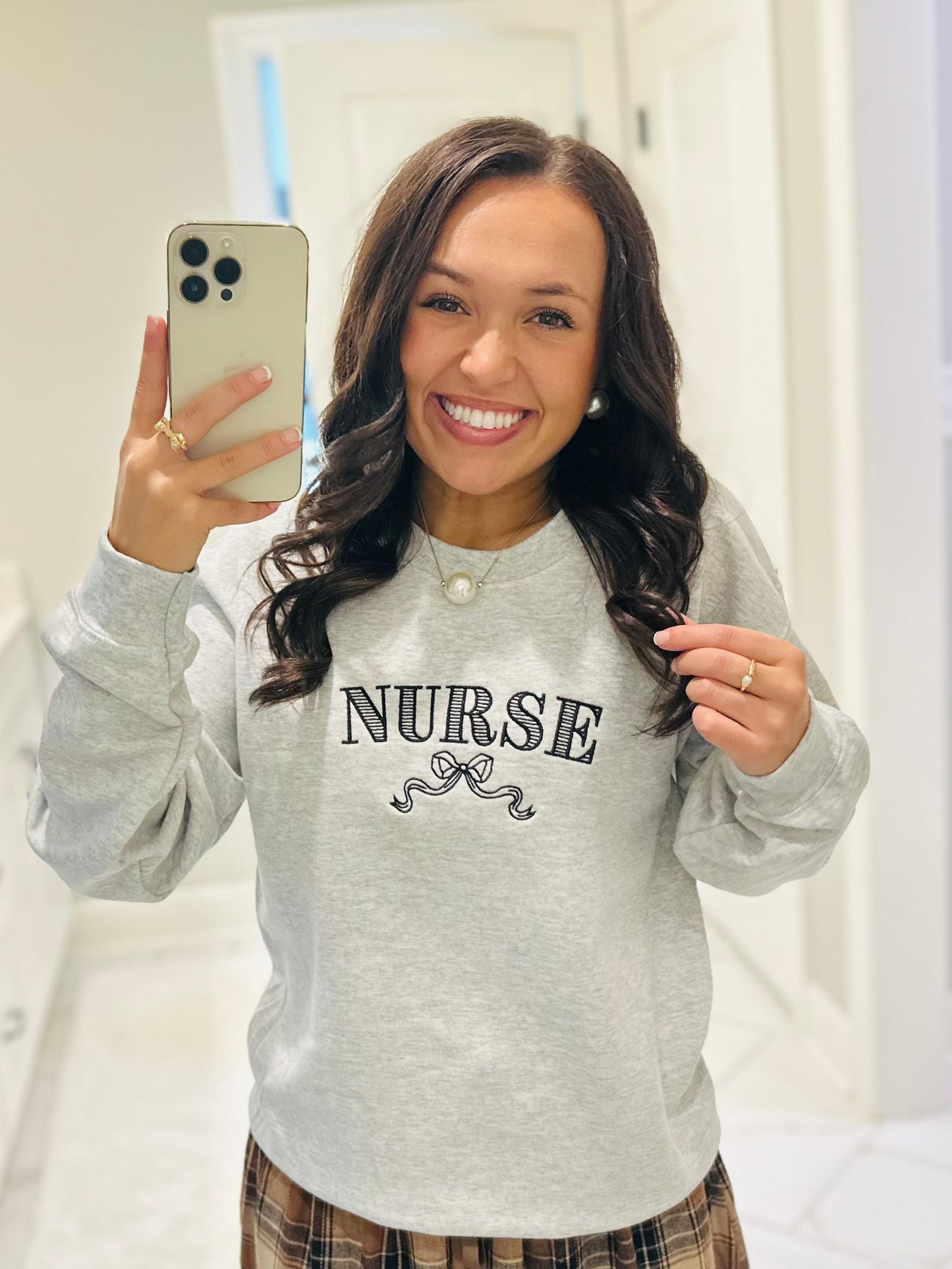 The Nurse Bow Embroidered Crewneck