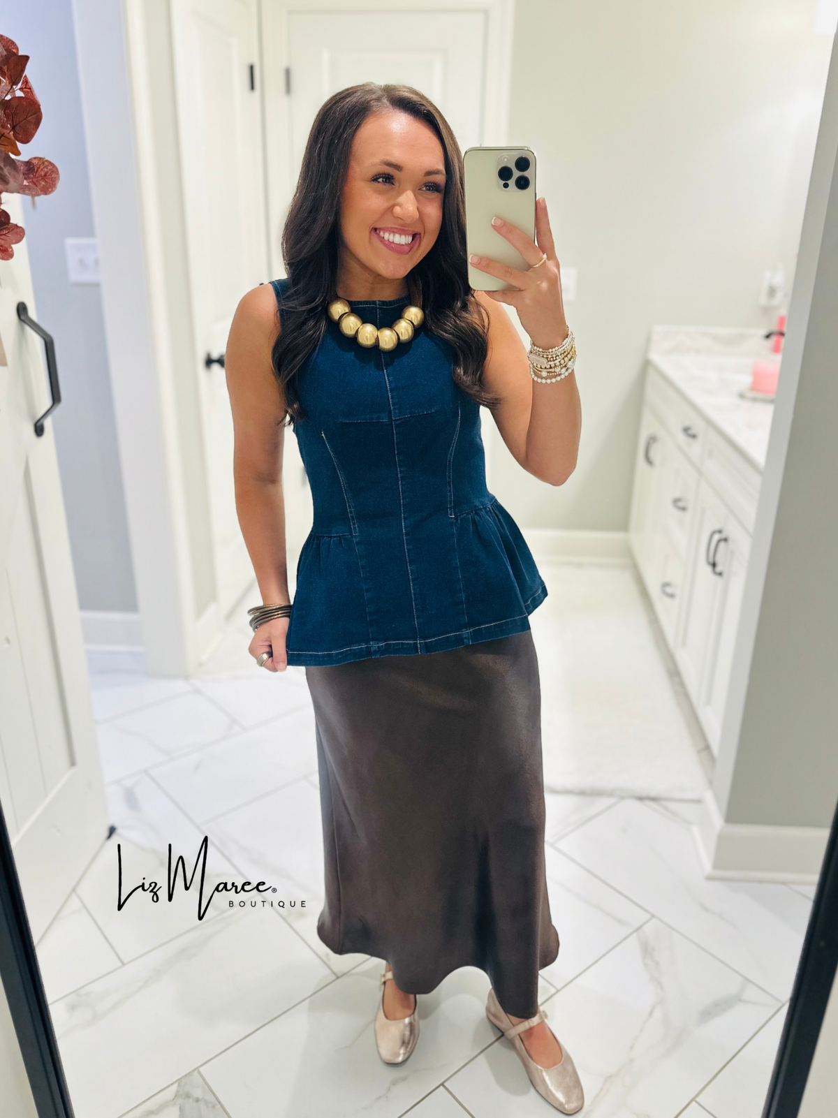 The Nell Denim Peplum Top