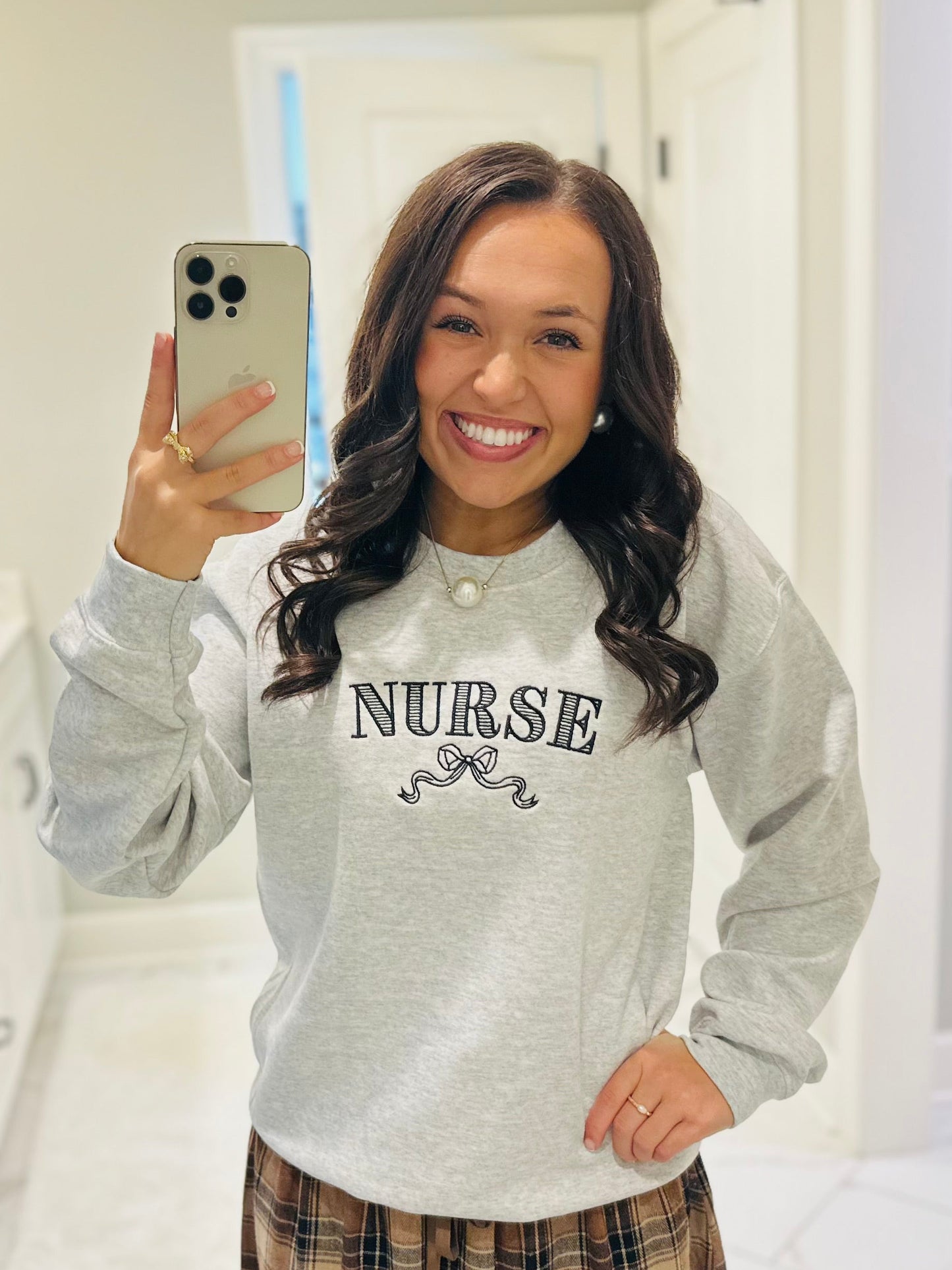 The Nurse Bow Embroidered Crewneck