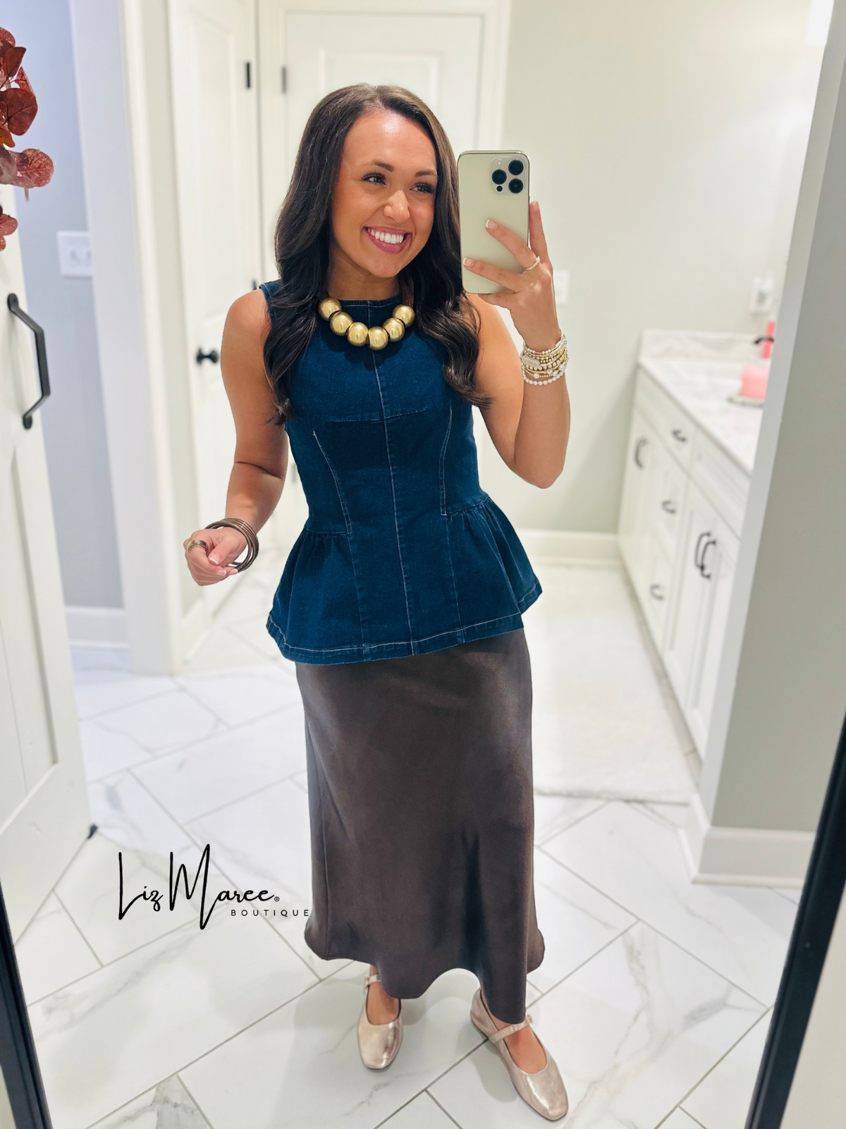 The Nell Denim Peplum Top