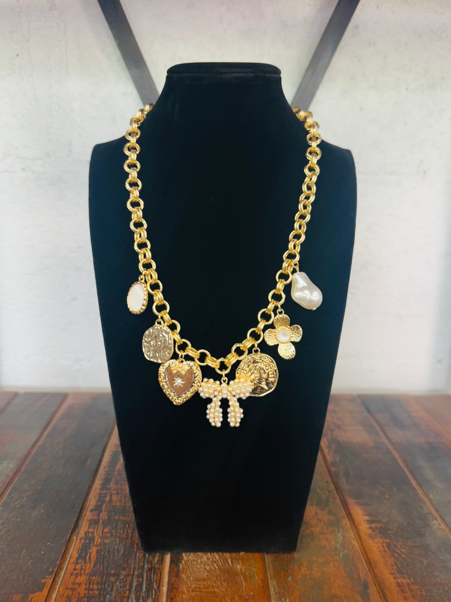 Gold Bow Multi Charm Necklace