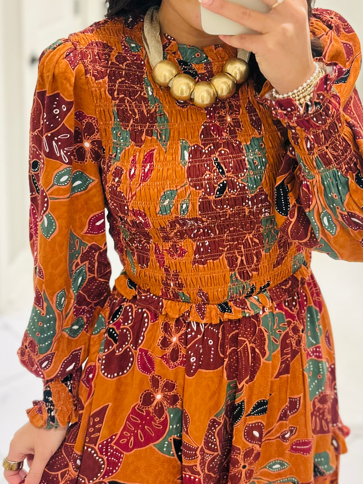 The Marven Rust Brown Floral Smocked Midi Dress