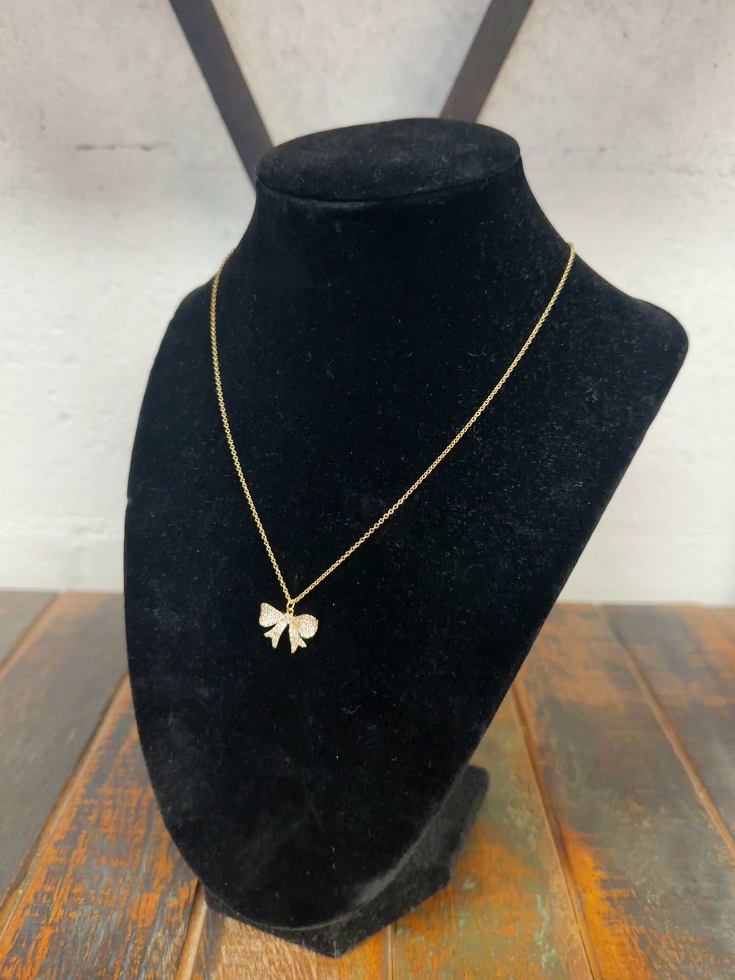 Gold Cubic Zirconia Bow Pendant Necklace