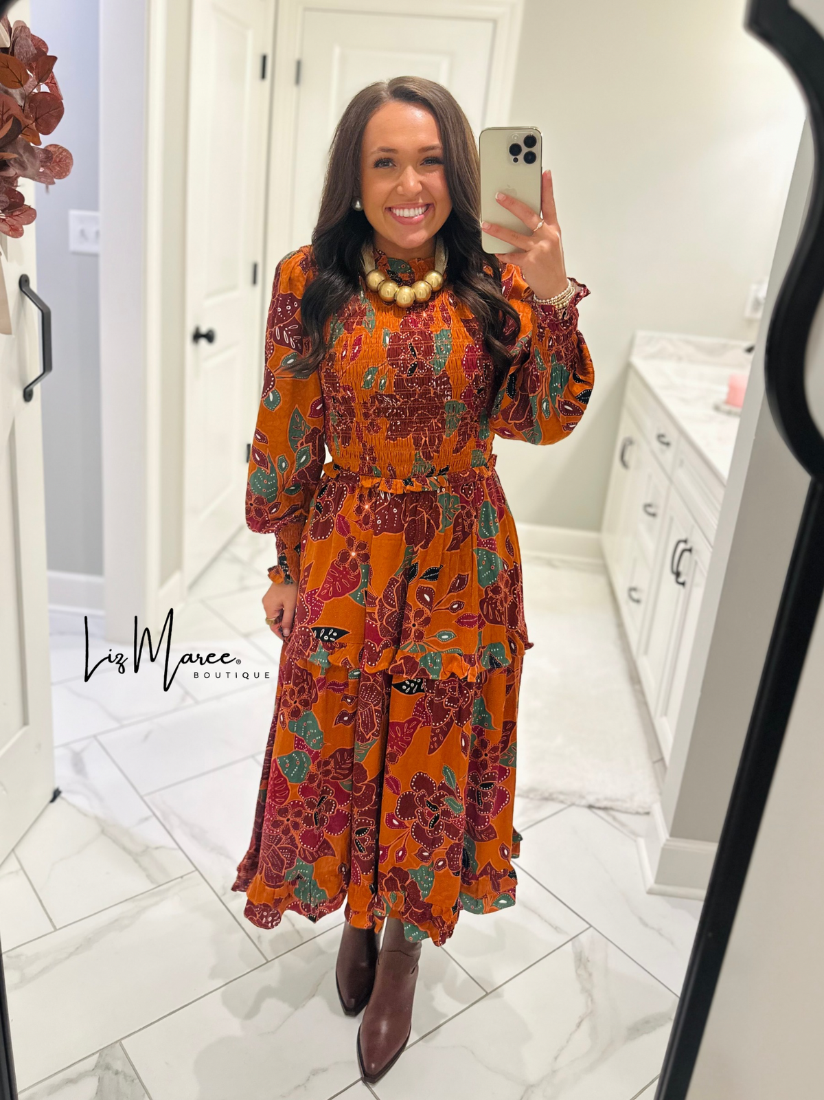 The Marven Rust Brown Floral Smocked Midi Dress