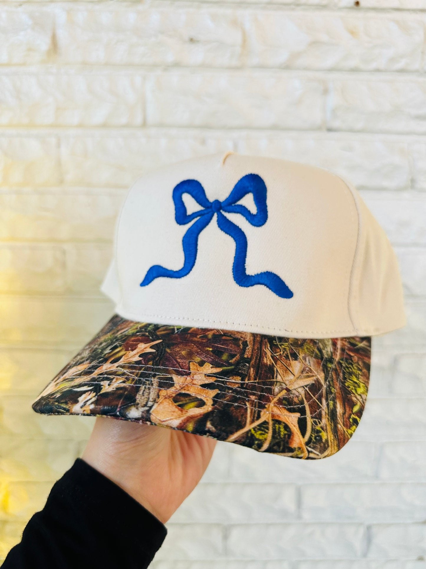 The Royal Blue Bow + Camo Trucker Hat