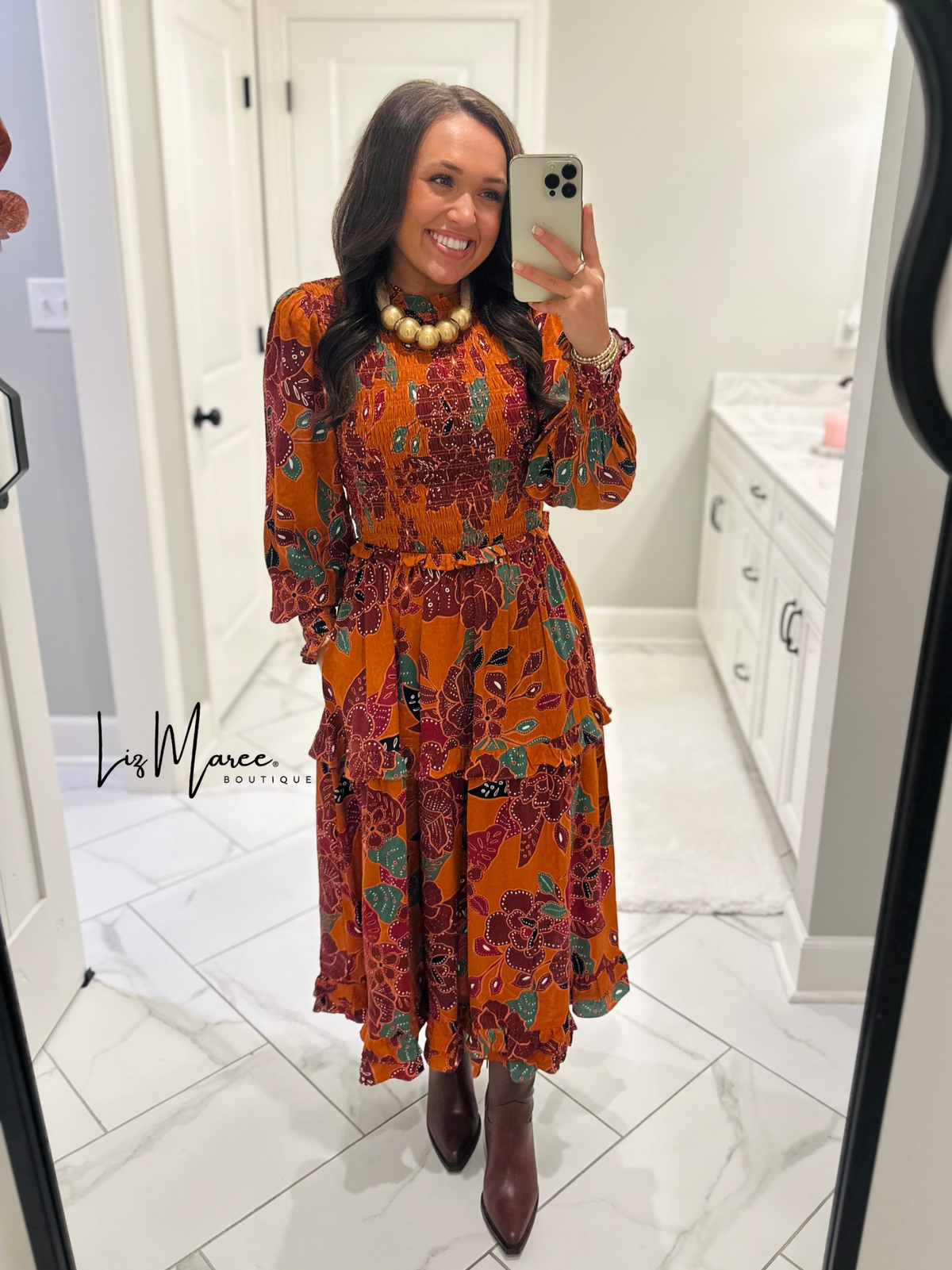 The Marven Rust Brown Floral Smocked Midi Dress