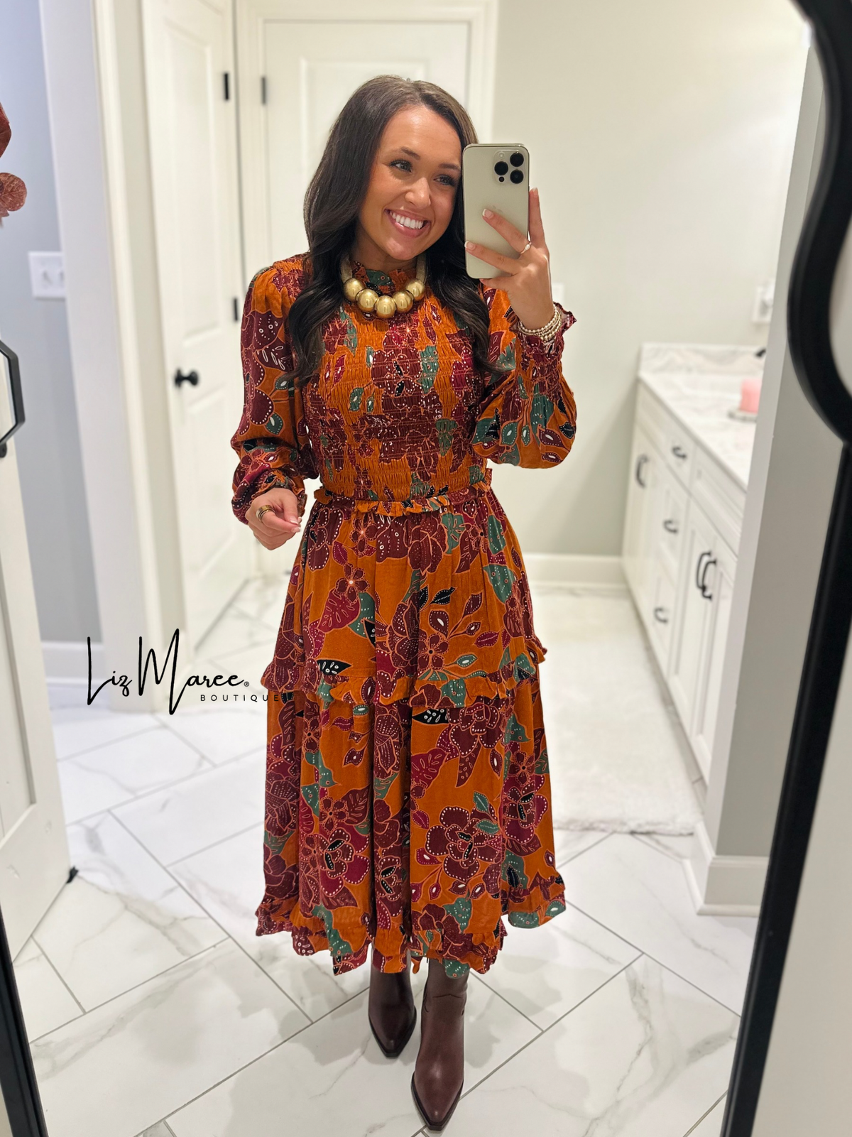 The Marven Rust Brown Floral Smocked Midi Dress