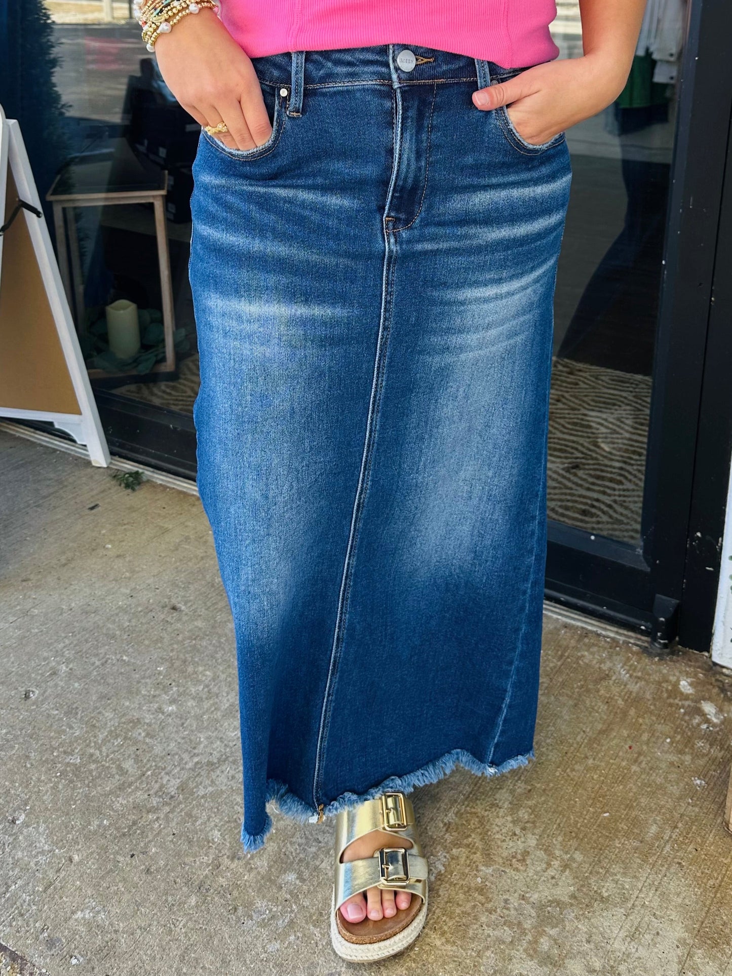 The High Rise Dark Denim Frayed Long Skirt