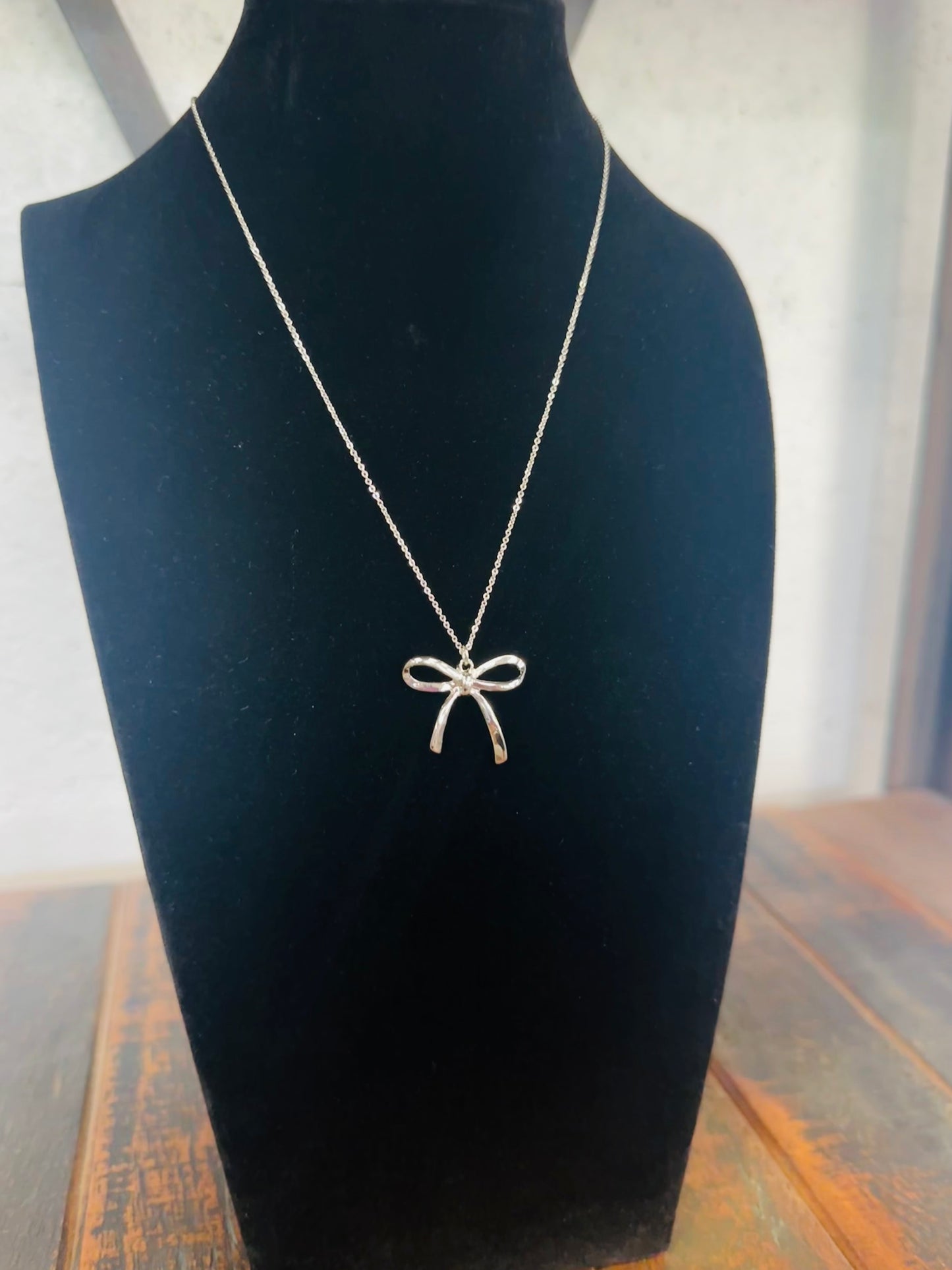 Silver Bow Pendant Necklace