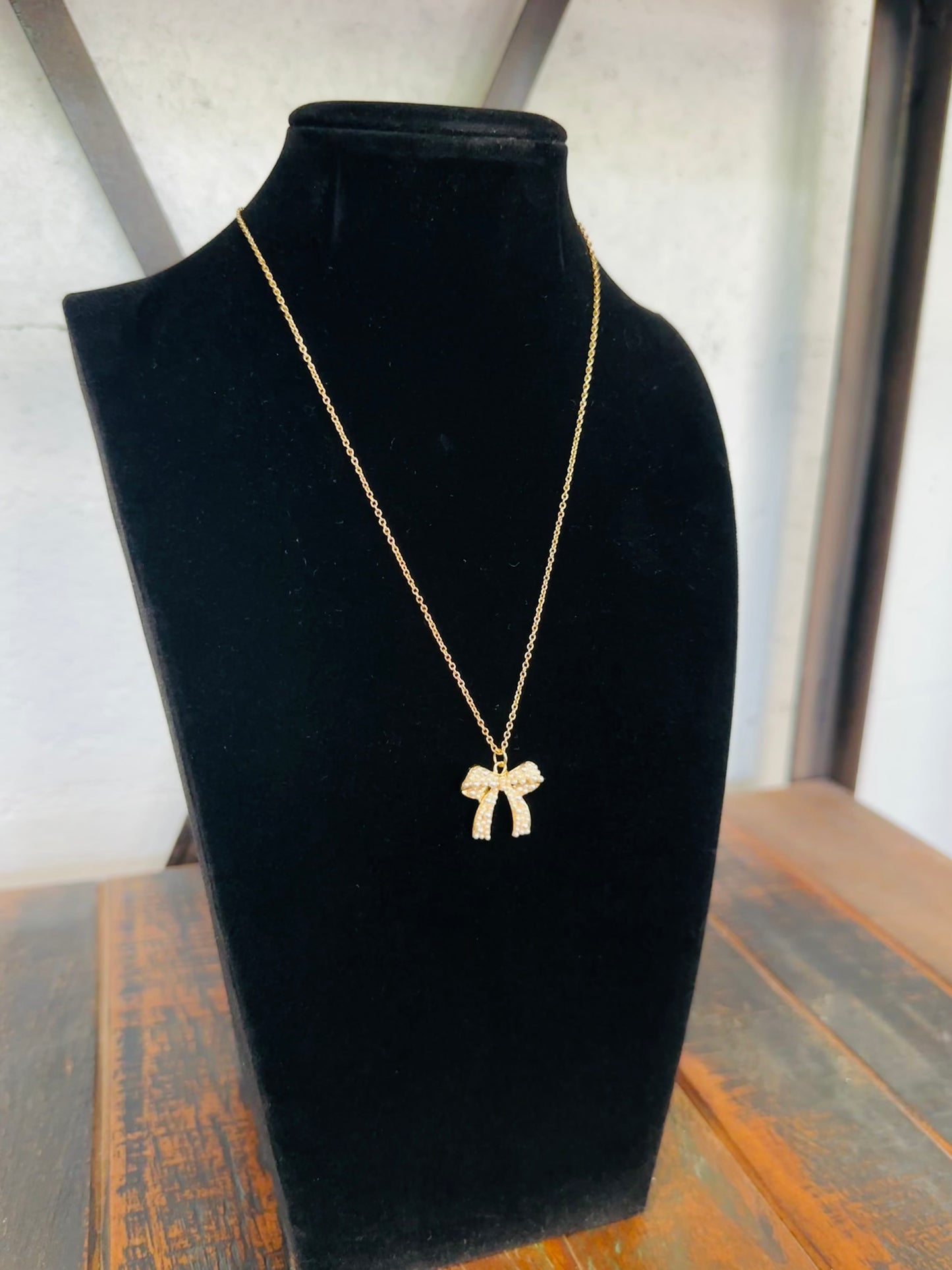 Gold Pearl Bow Pendant Necklace