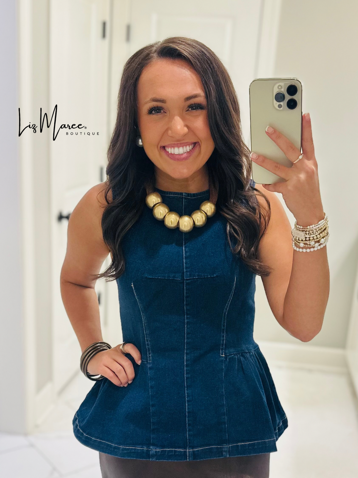 The Nell Denim Peplum Top