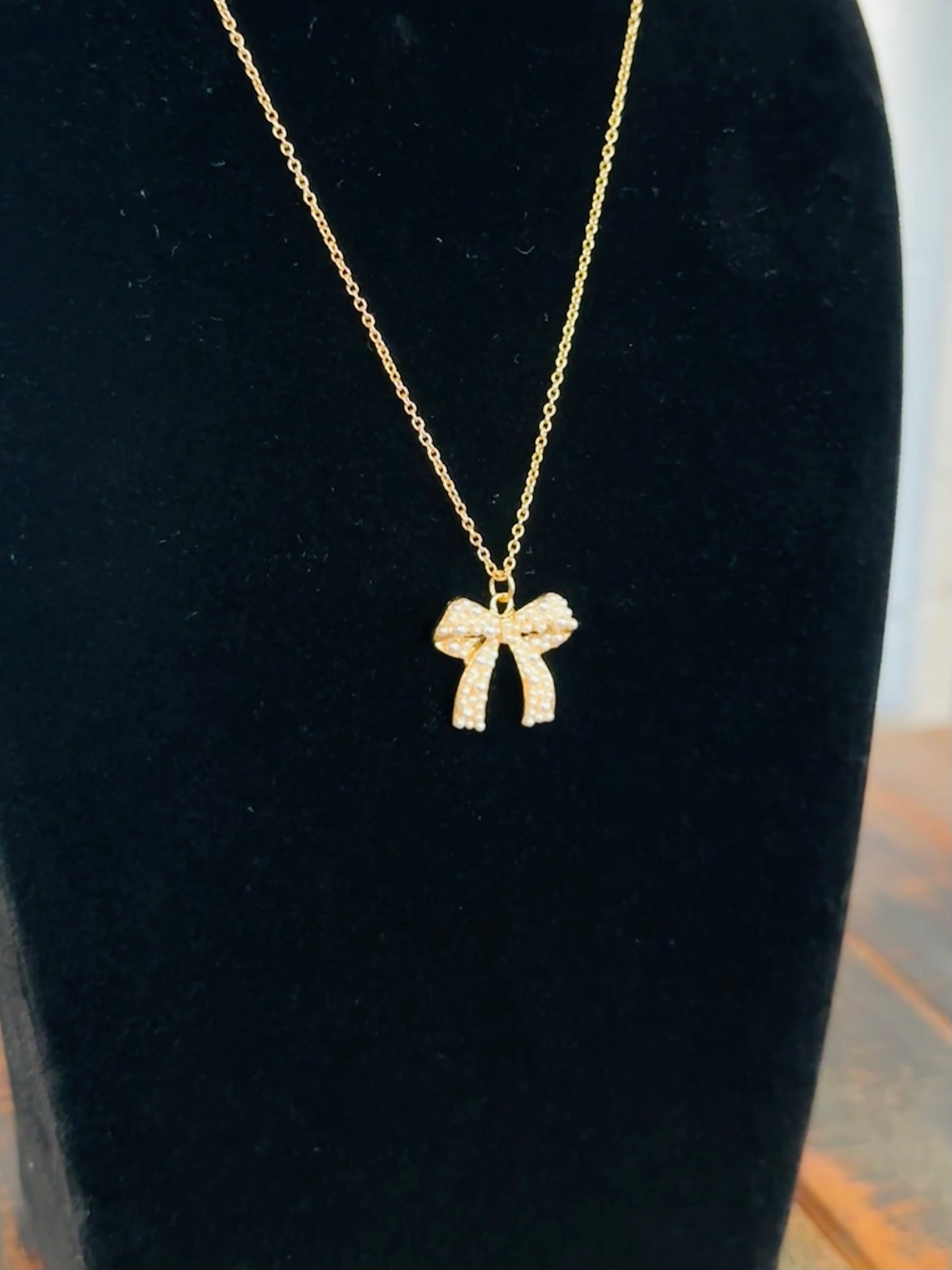 Gold Pearl Bow Pendant Necklace