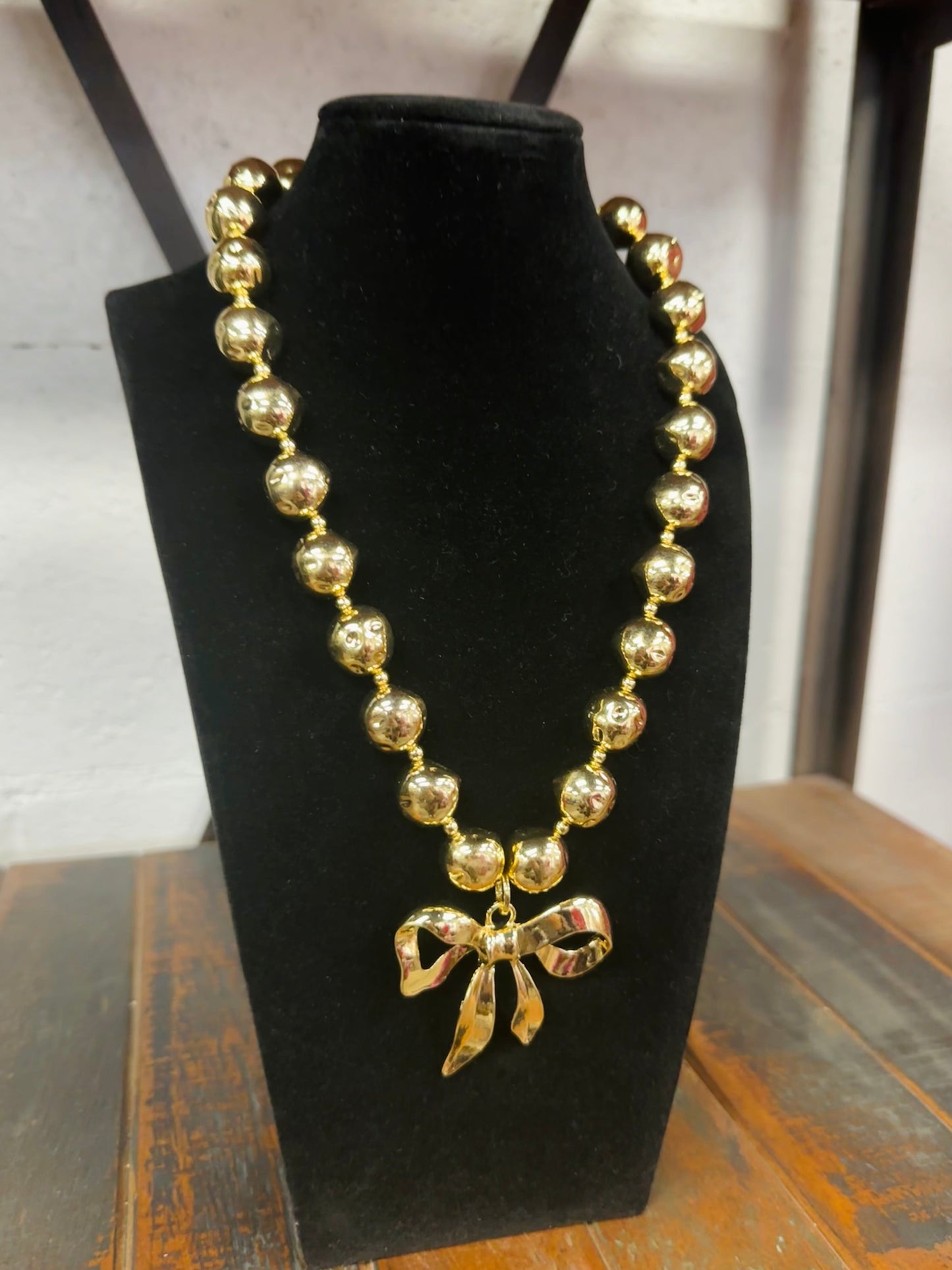 Gold Bow Ball Beaded Statement Necklace