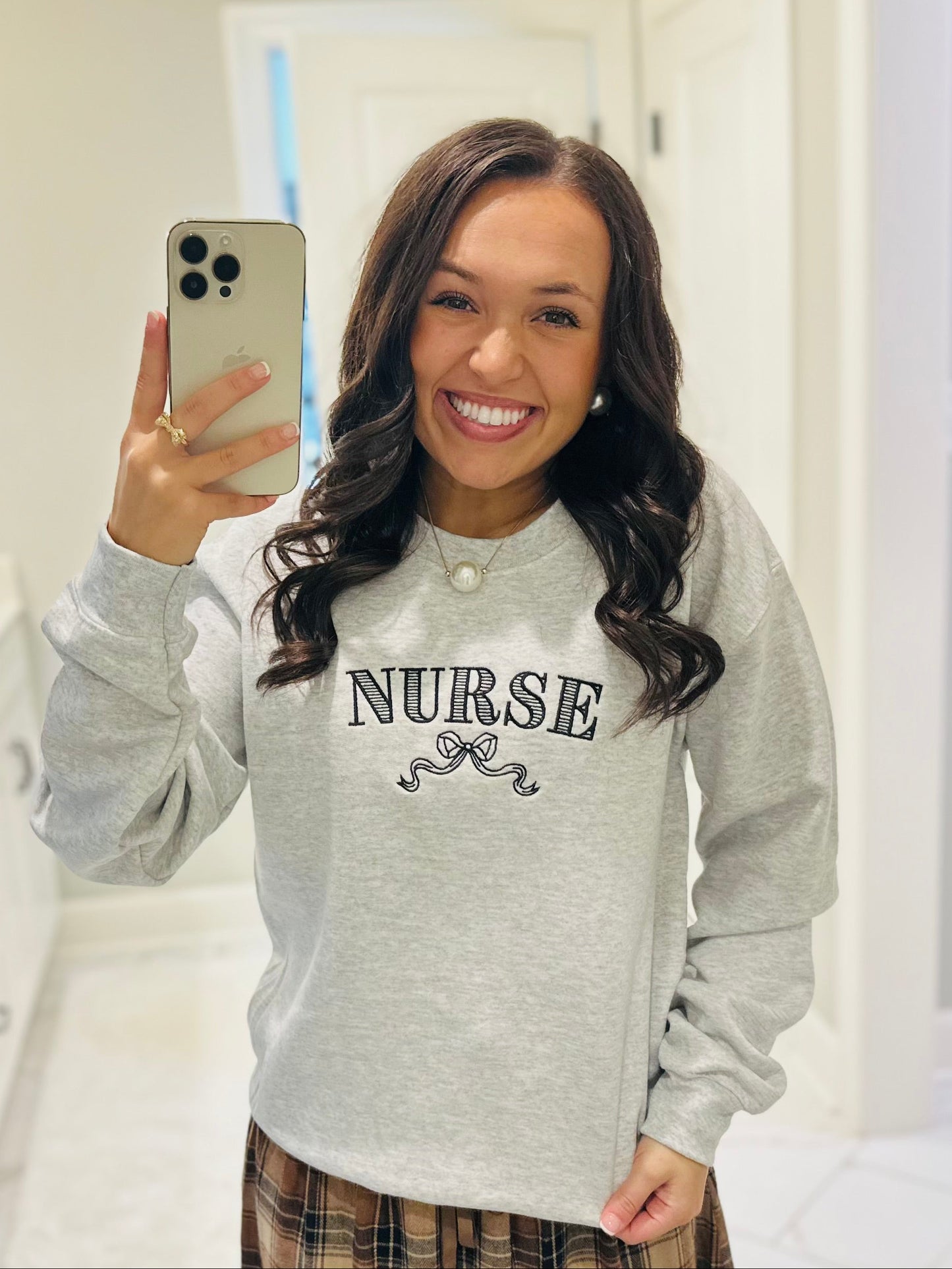 The Nurse Bow Embroidered Crewneck