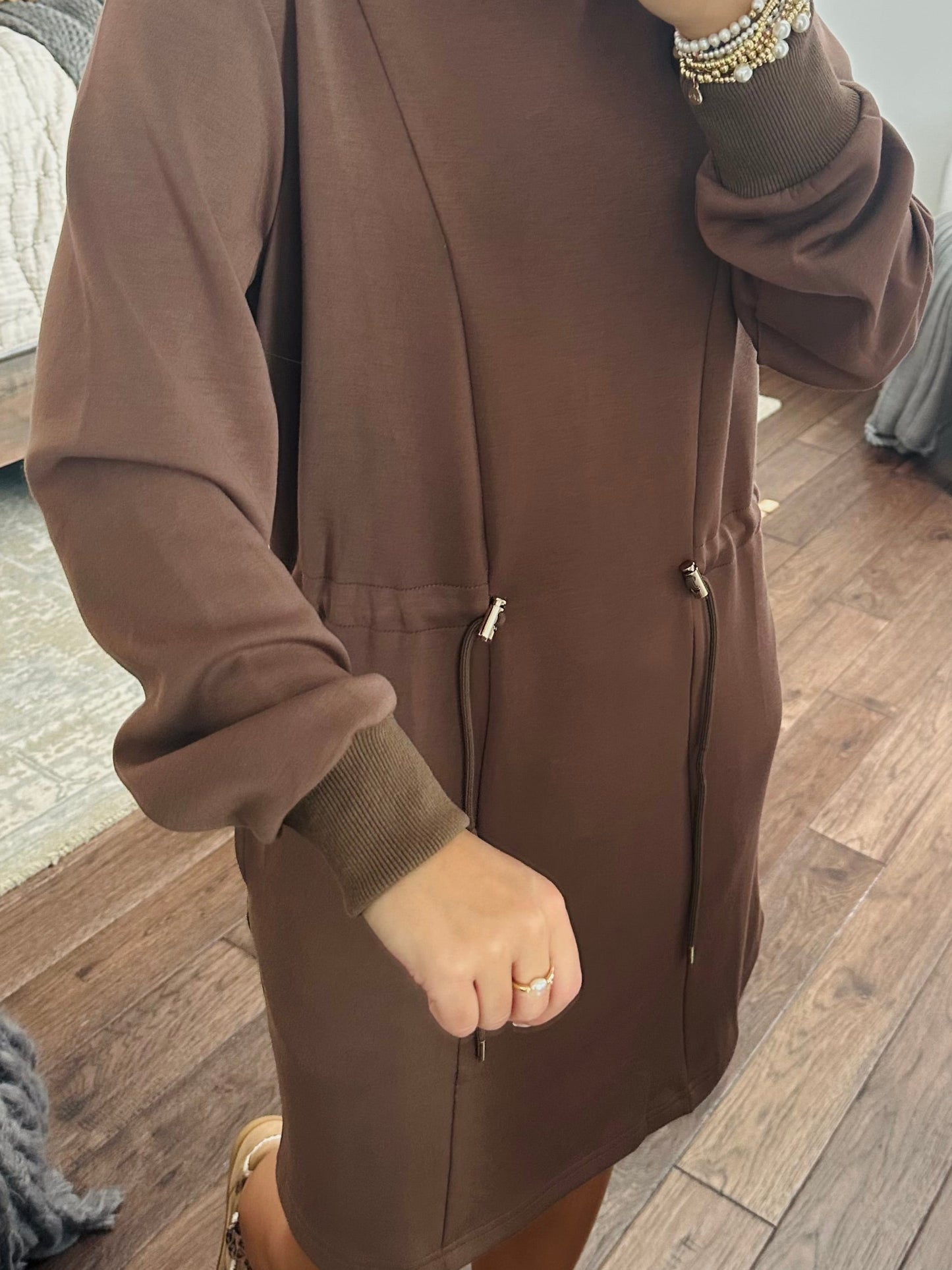 The Mocha Jersey Knit Long Sleeve Drawstring Dress