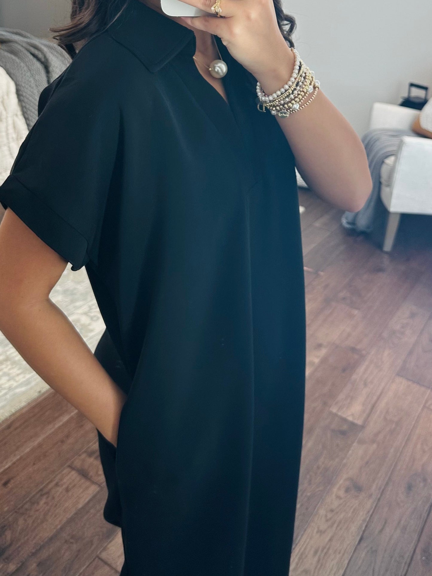 The Nola Black V-neck Midi Dress