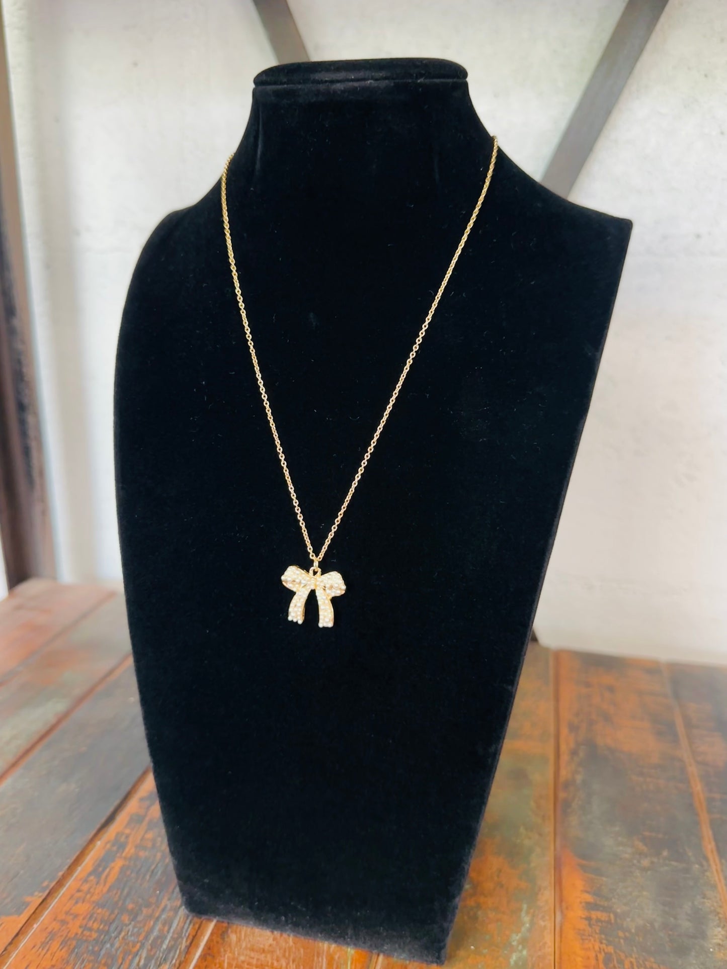 Gold Pearl Bow Pendant Necklace