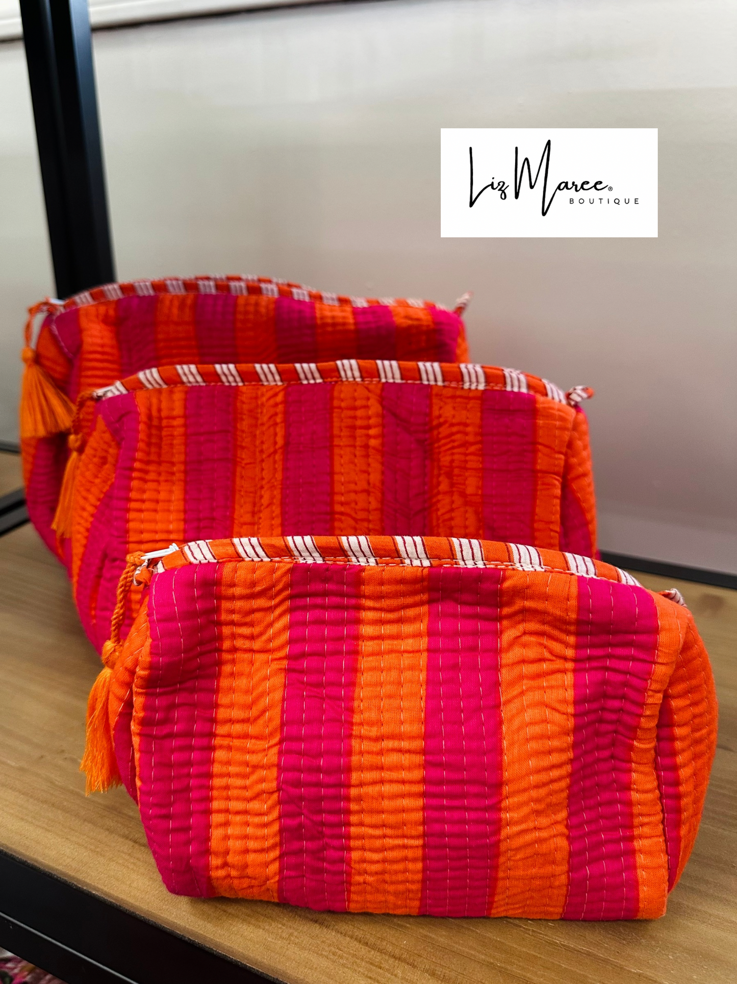 The Pink + Orange Striped Quilted Cosmetic Bags - Set of 3